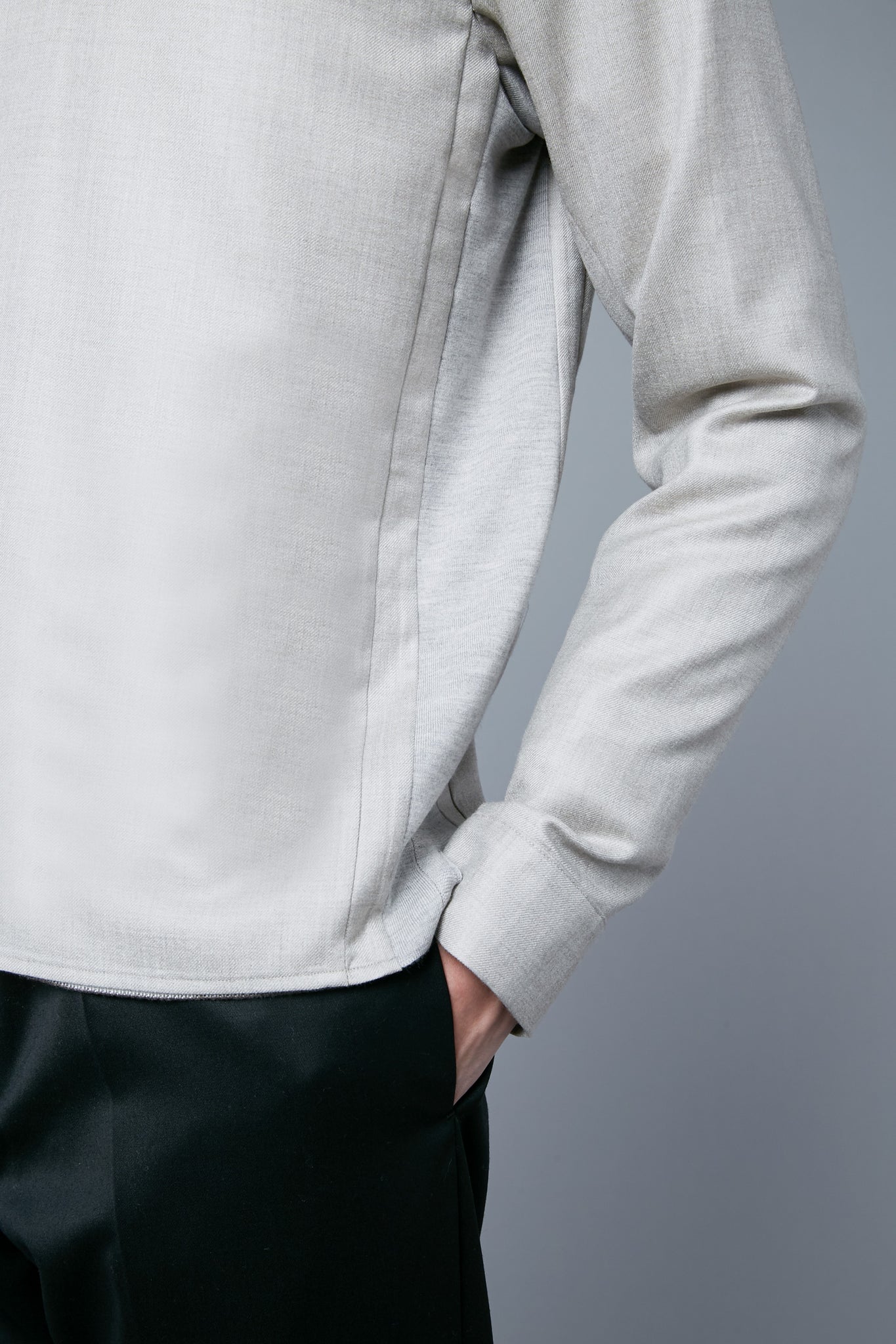 2nd Detail View: Model Qiang Li wearing Woven Hoodie