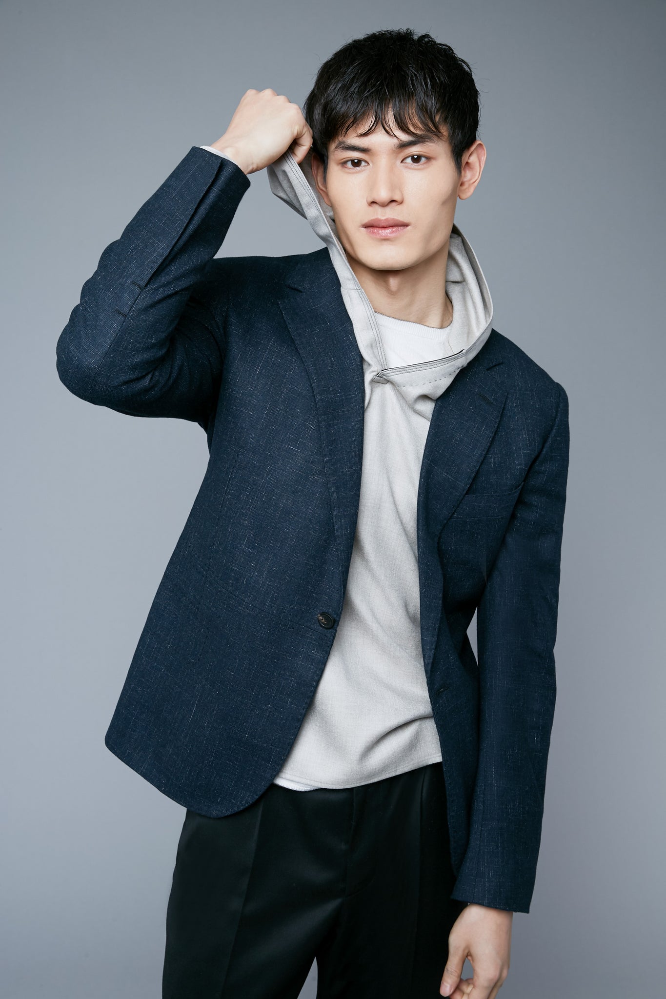 Mood Layer View: Model Qiang Li wearing Woven Hoodie