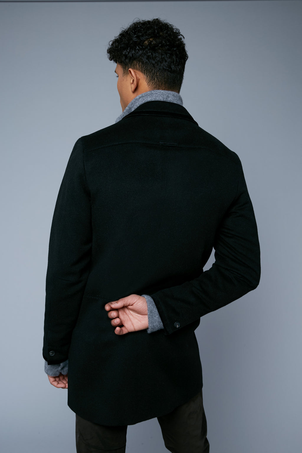 Mood View: Model Tre Boutilier wearing Camel Coat