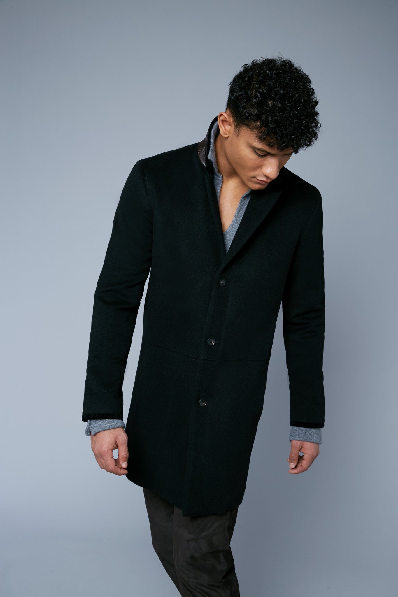 Mood View: Model Tre Boutilier wearing Camel Coat