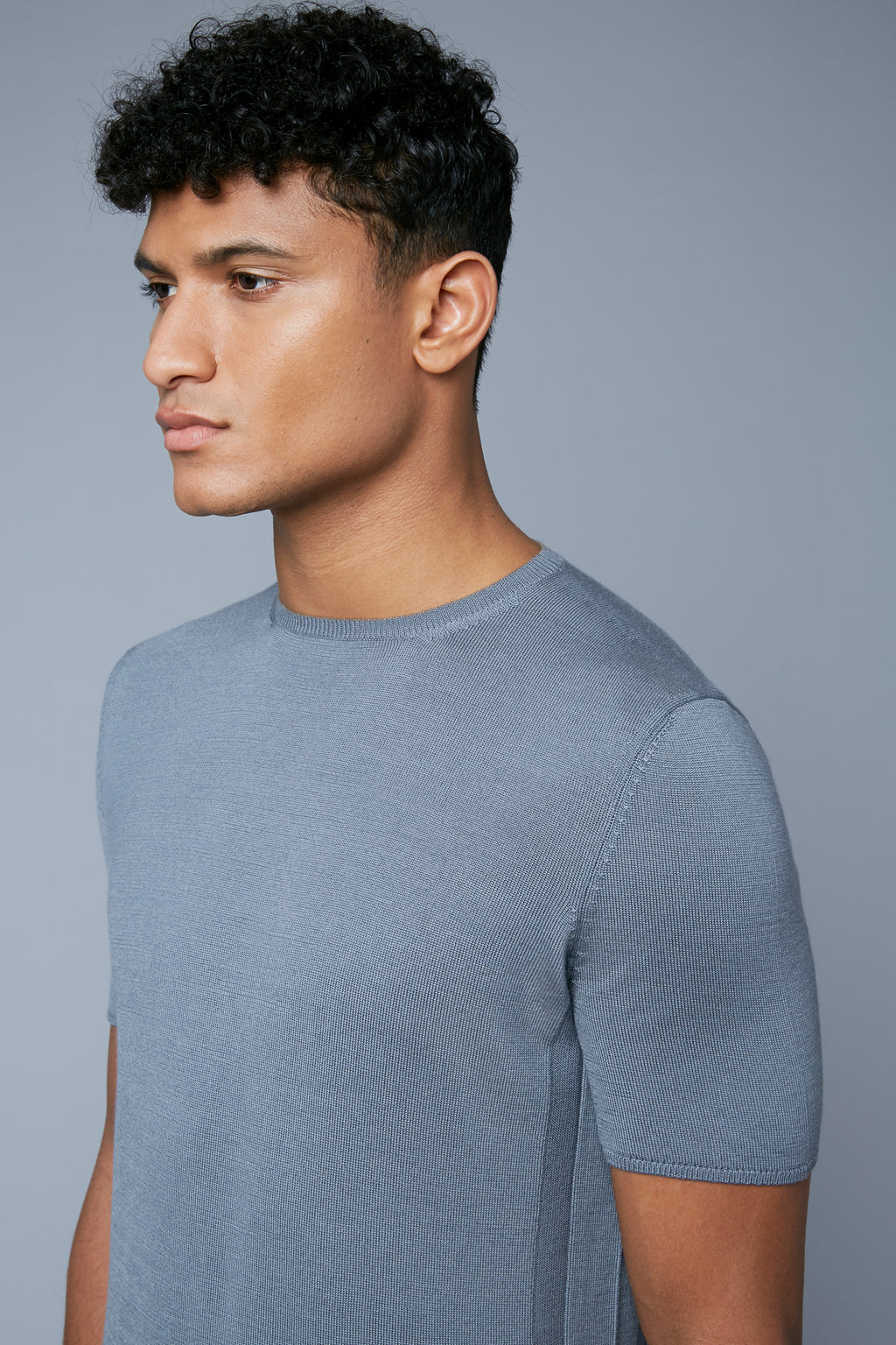 Mood View: Model Tre Boutilier wearing Short Sleeve Sweater Tee