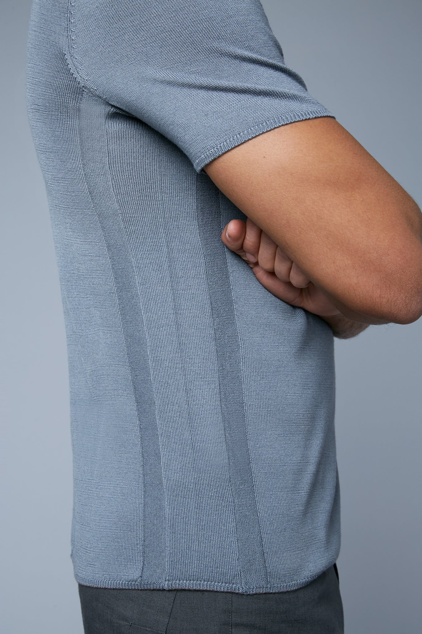 Detail View: Model Tre Boutilier wearing Short Sleeve Sweater Tee