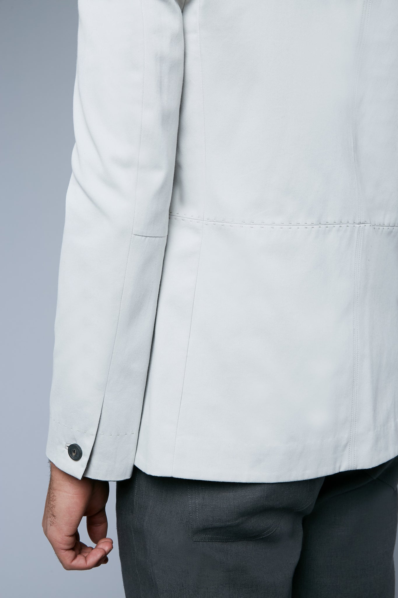 Detail View: Model Tre Boutilier wearing Peak Summer Jacket