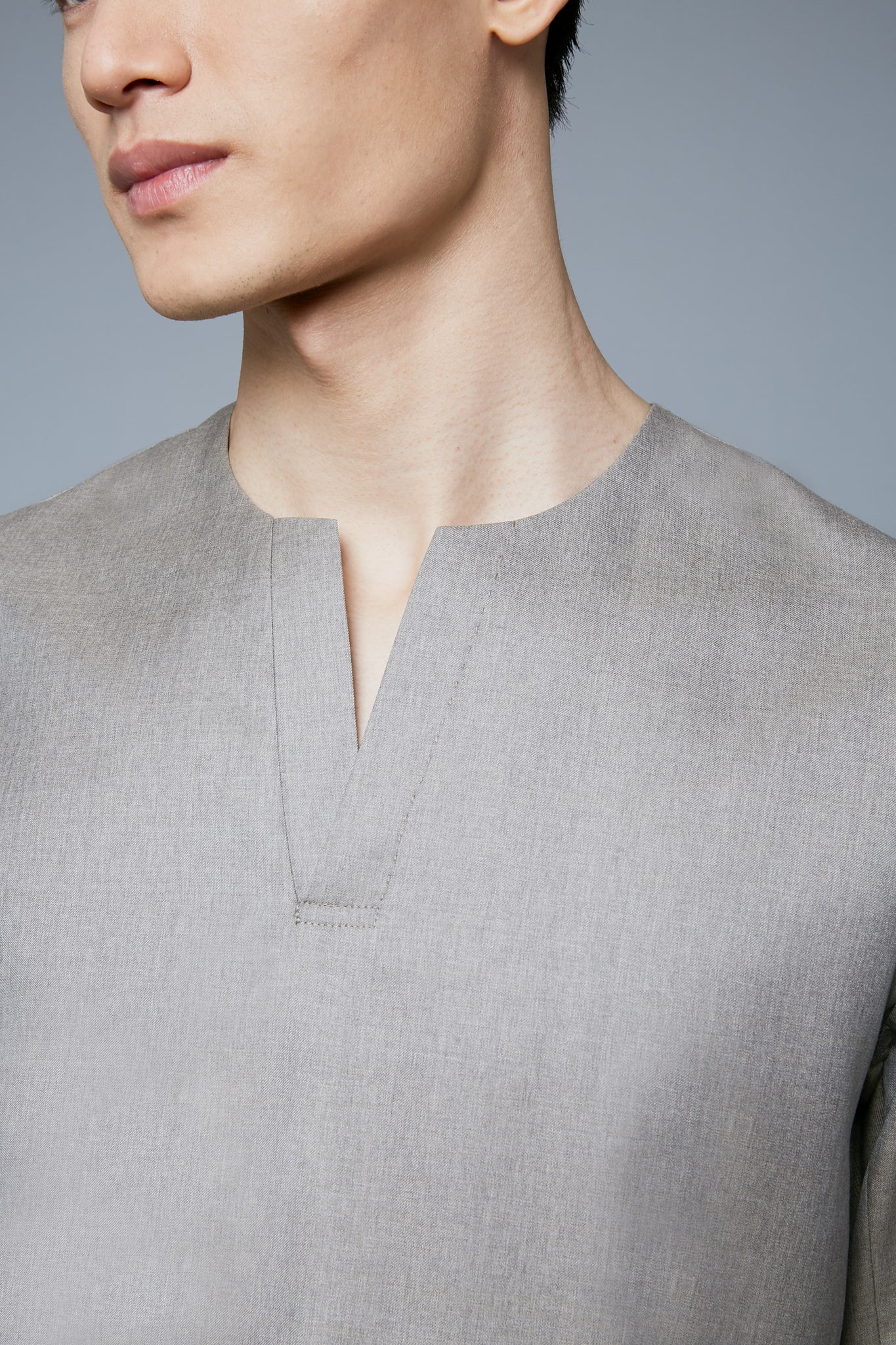 Detail View: Model Qiang Li wearing Woven Henley