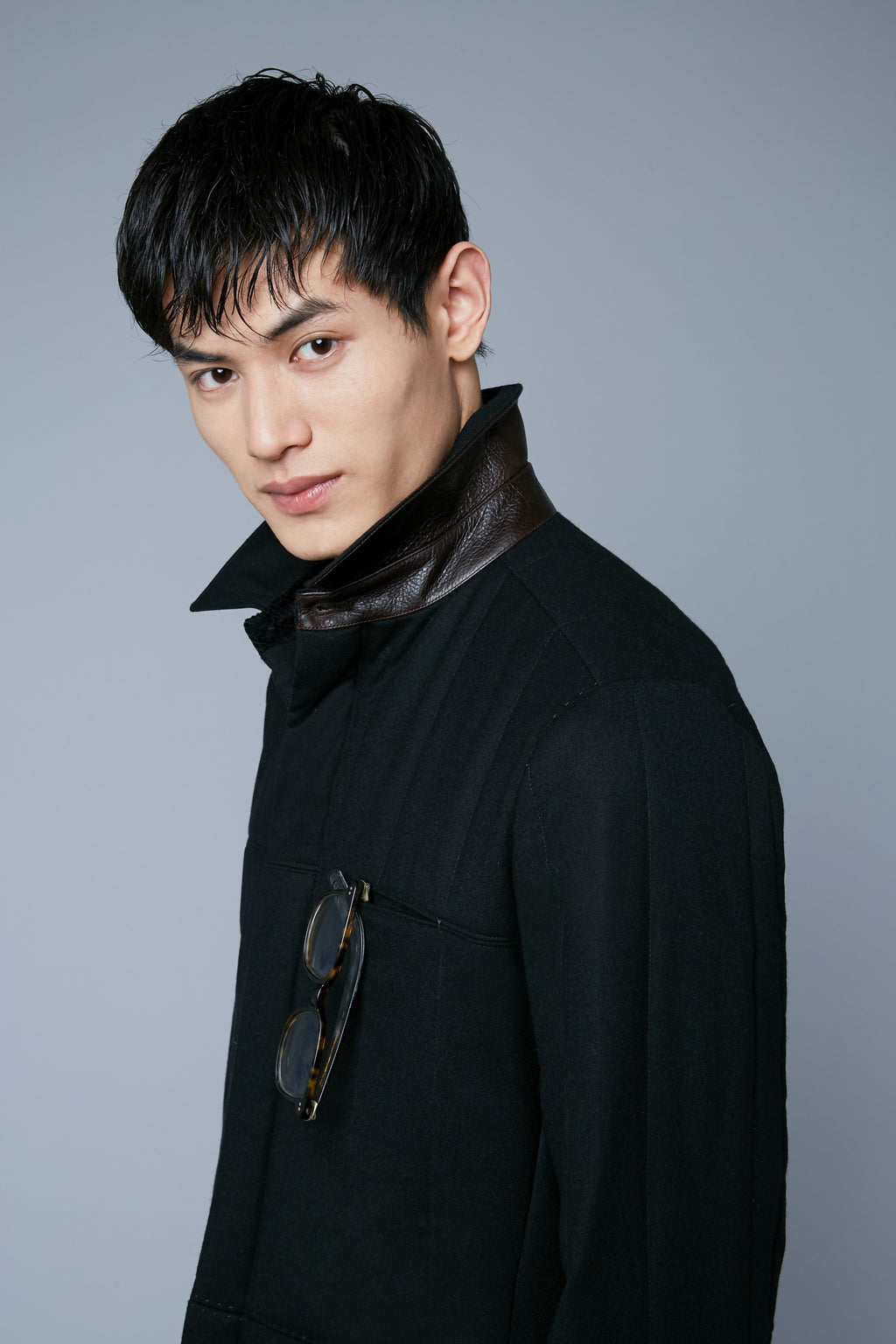 Detail View: Model Qiang Li wearing Down Téchin Jacket