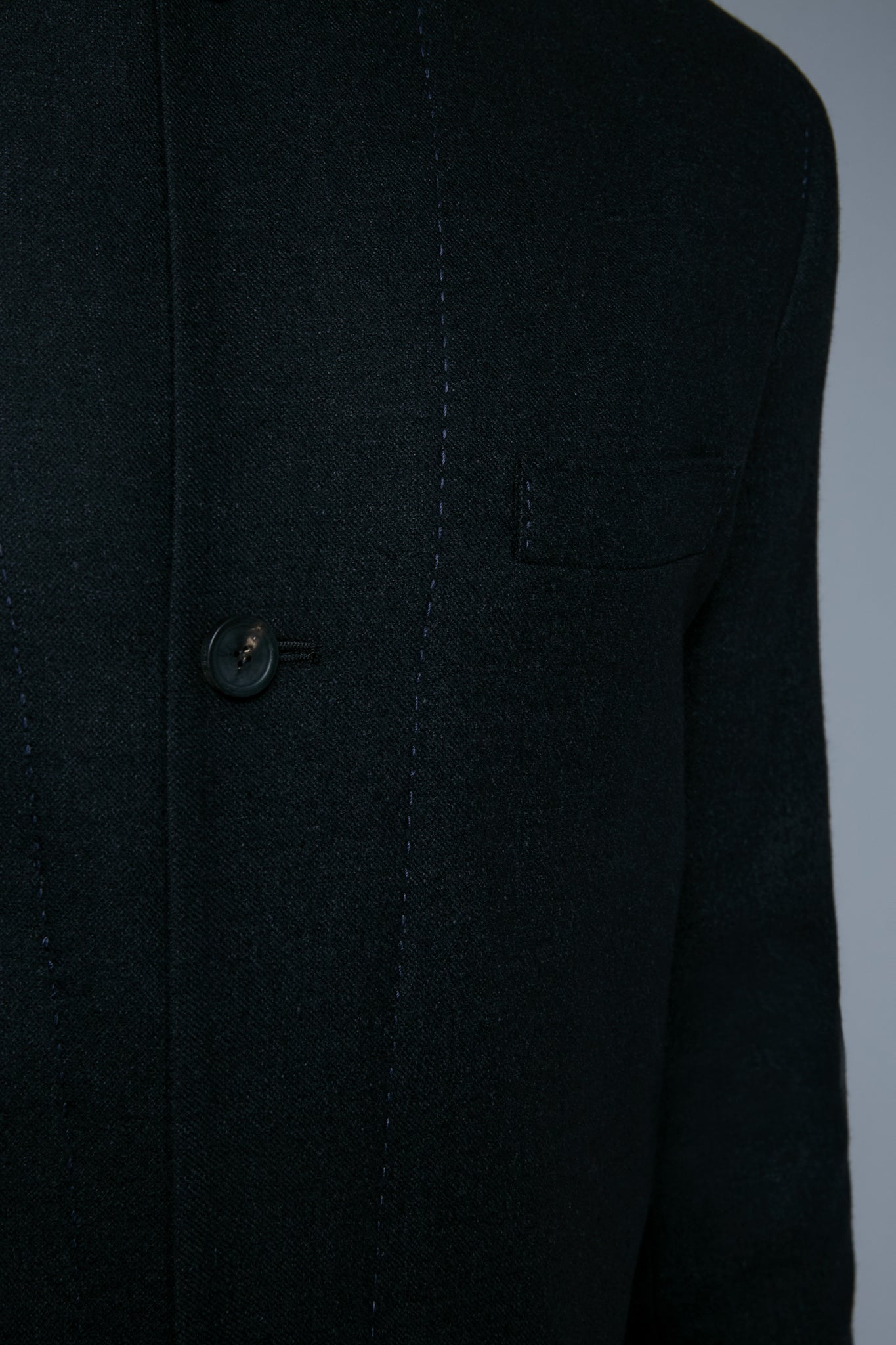Detail View: Model Milos Drago wearing Compass Jacket