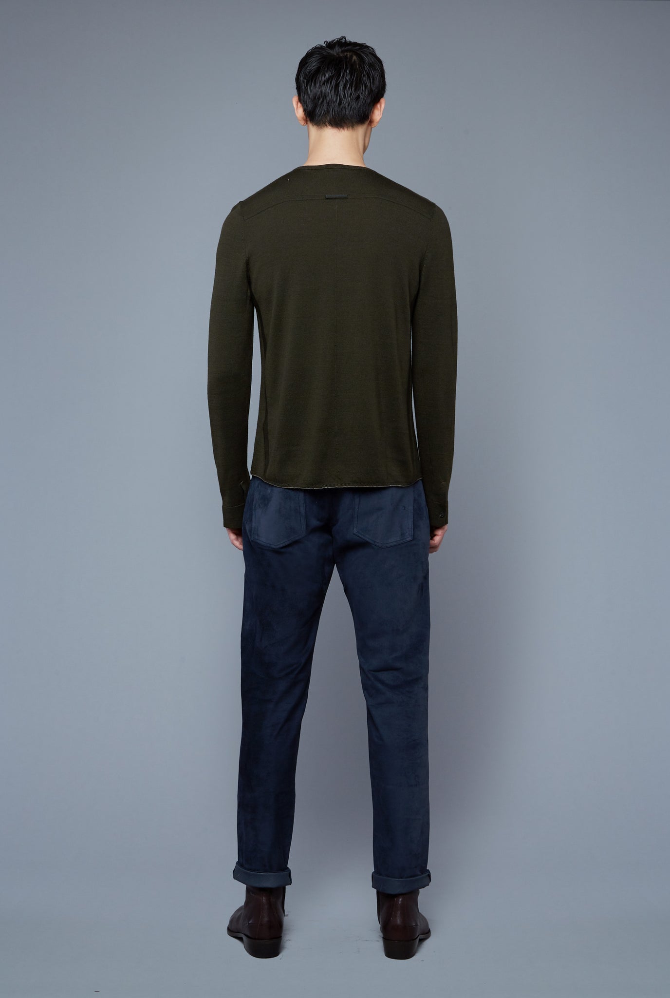 Back View: Model Qiang Li wearing Long Sleeve Sweater Tee
