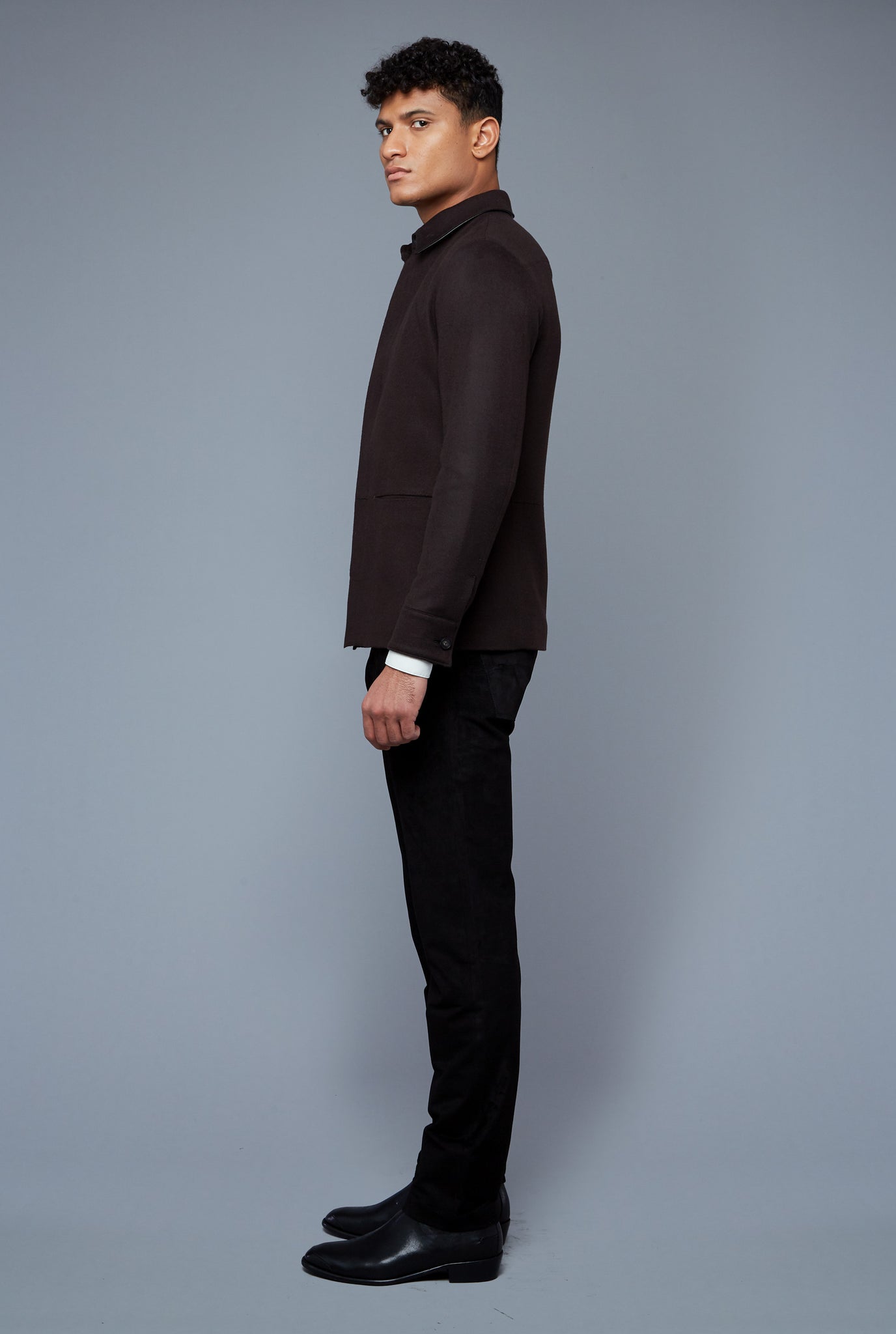Side View: Model Tre Boutilier wearing Téchin Jacket