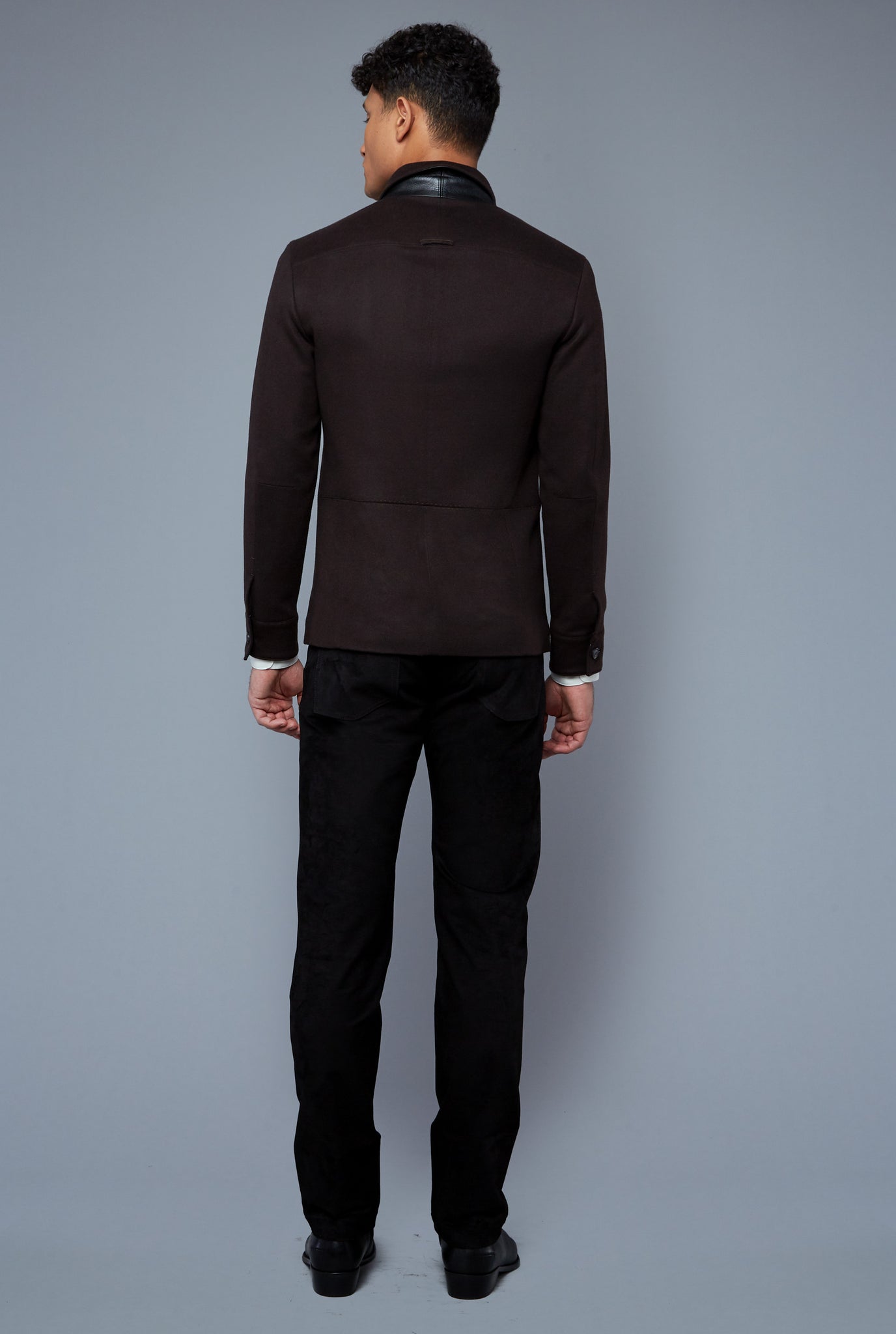 Back View: Model Tre Boutilier wearing Téchin Jacket
