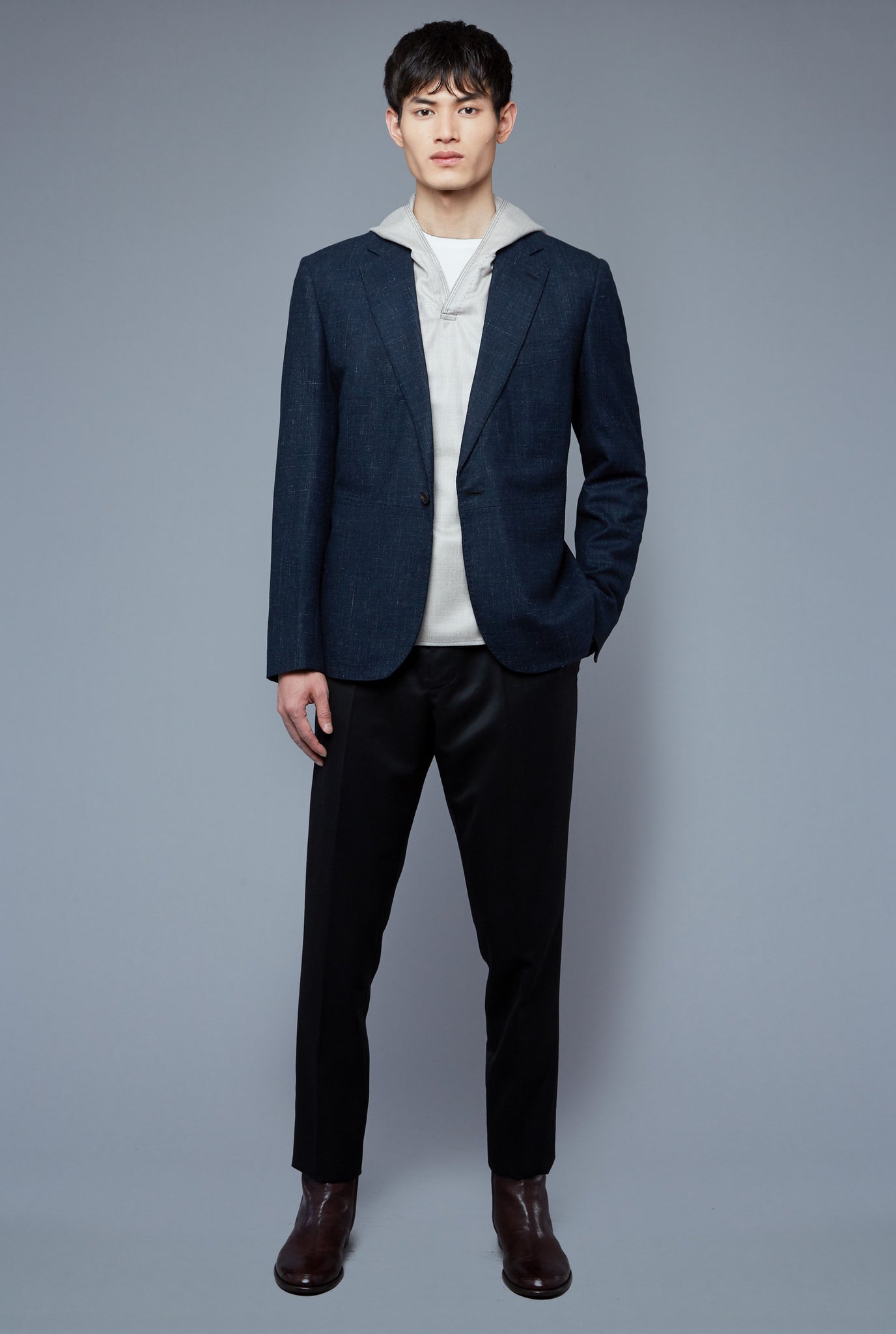 Front Layer View: Model Qiang Li wearing Woven Hoodie