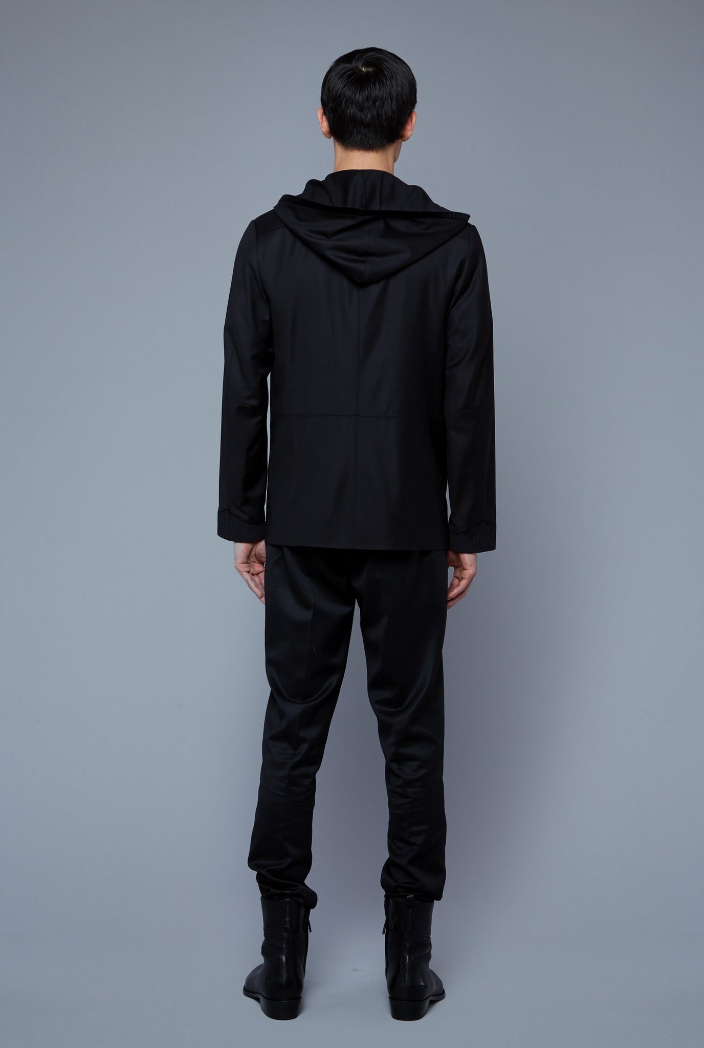 Back View: Model Qiang Li wearing Wool Hooded Jacket