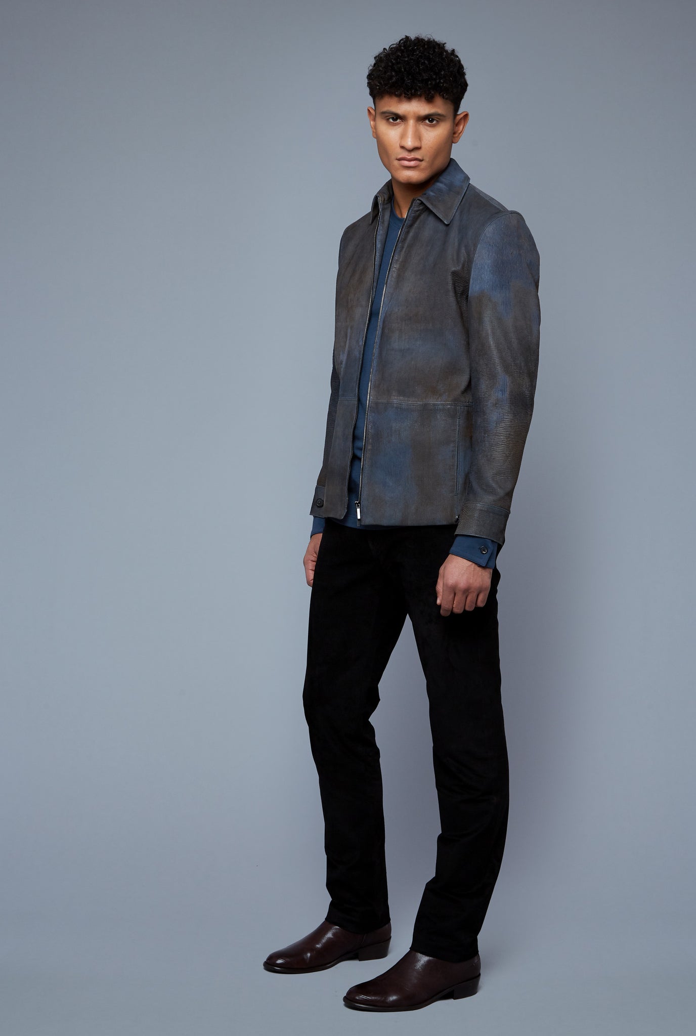 Three Quarter View: Model Tre Boutilier wearing Laser Scored Jacket