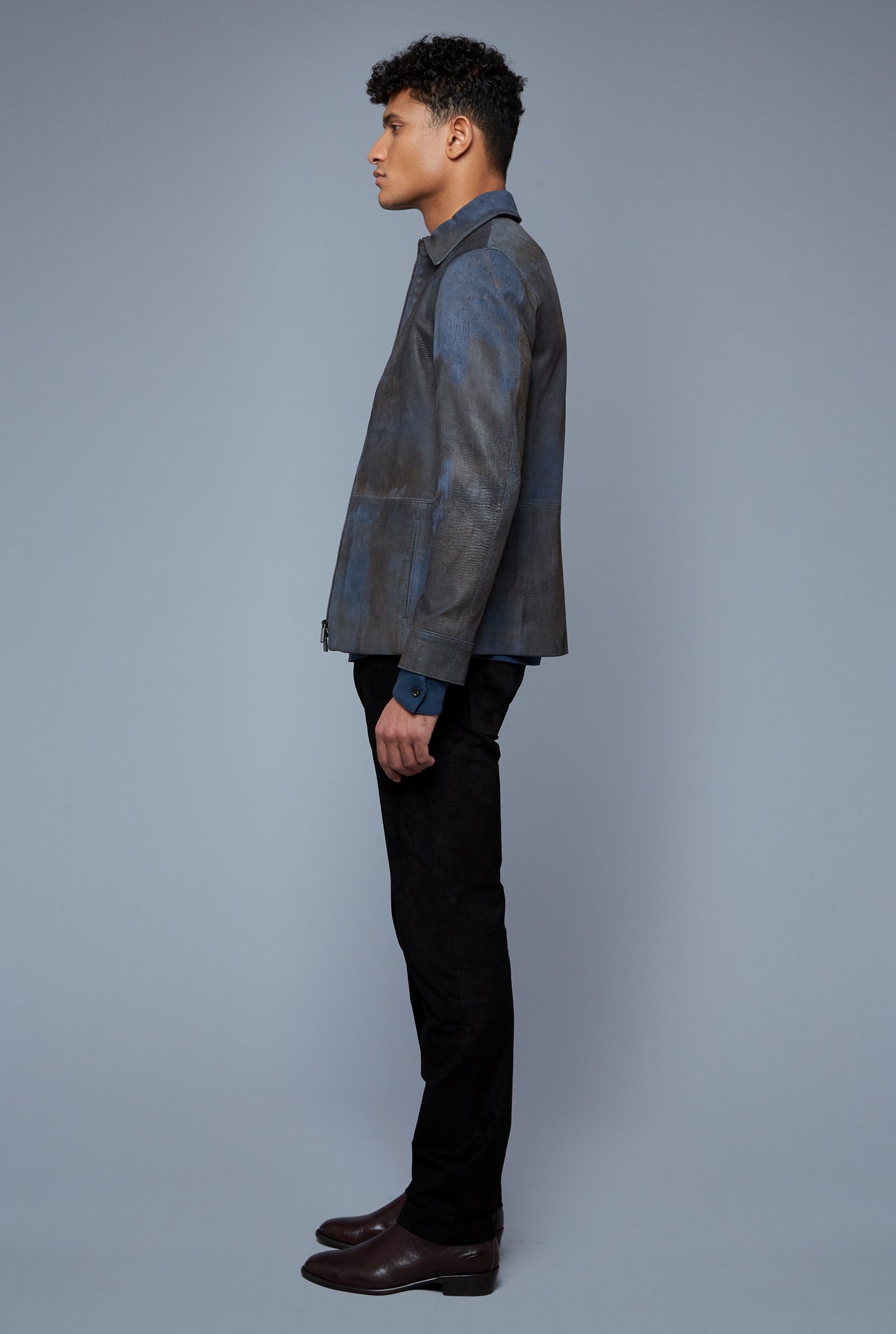 Side View: Model Tre Boutilier wearing Laser Scored Jacket