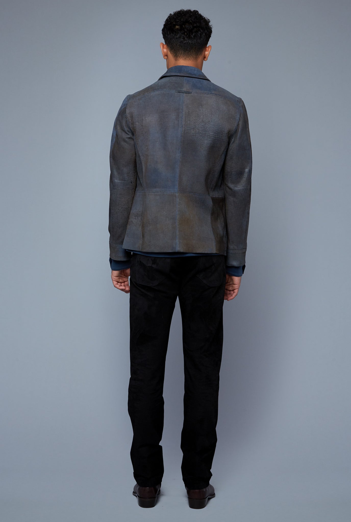 Back View: Model Tre Boutilier wearing Laser Scored Jacket