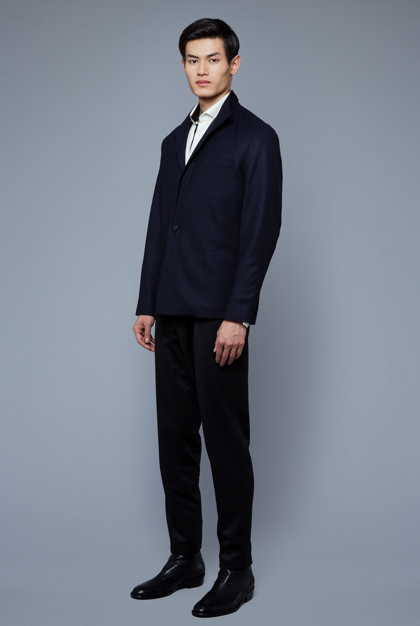 Three Quarter View: Model Qiang Li wearing Architect's Jacket