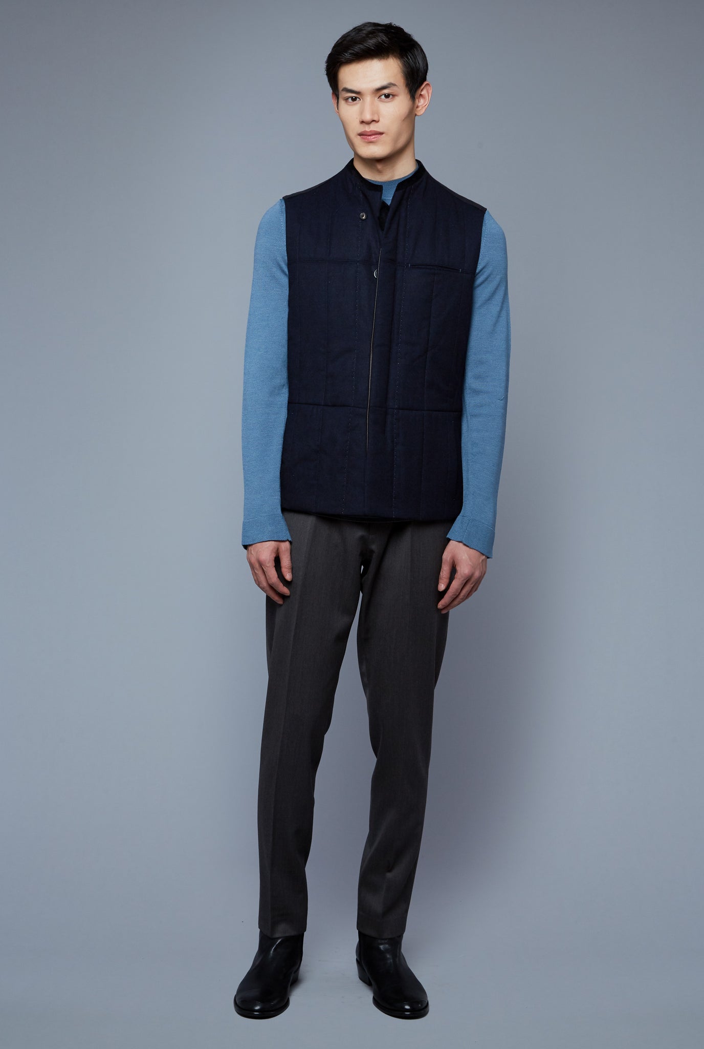 Front View: Model Qiang Li wearing Down Vest