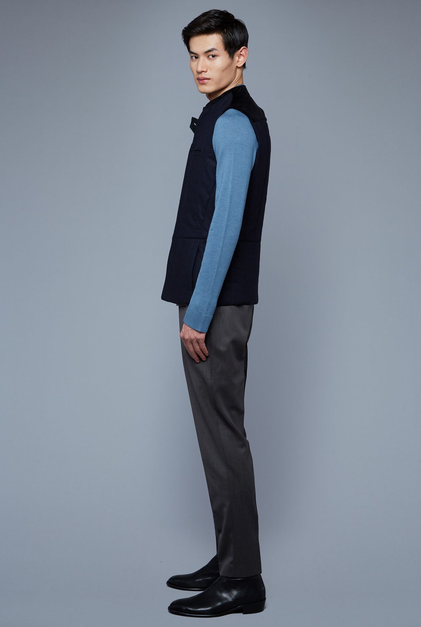 Side View: Model Qiang Li wearing Down Vest