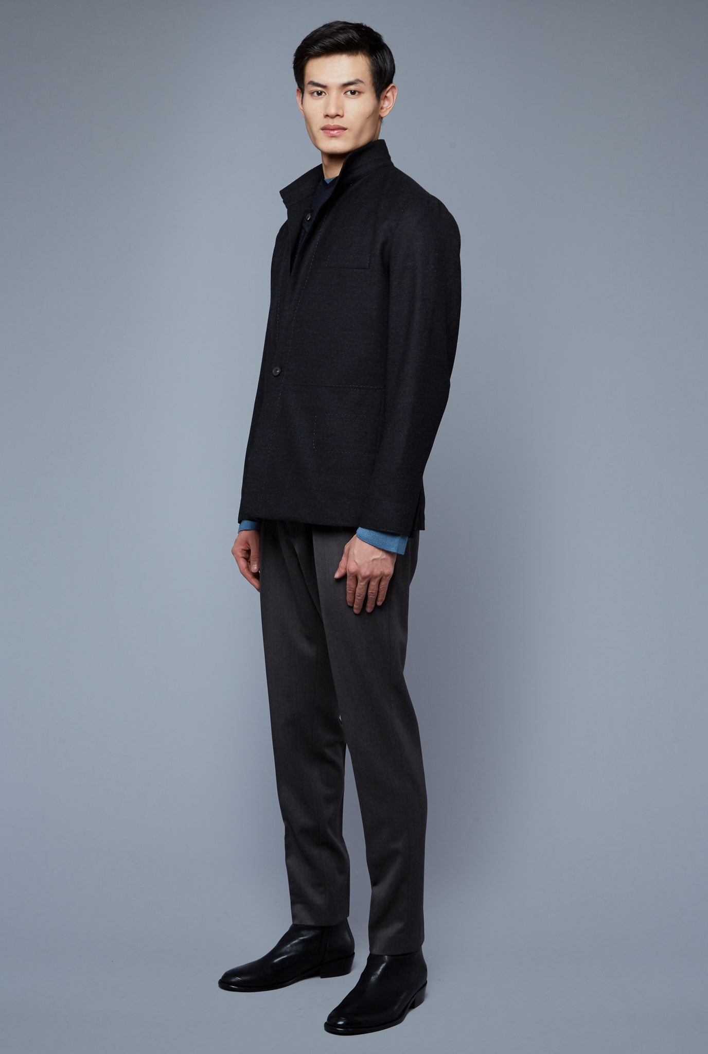Three Quarter View: Model Qiang Li wearing Architect's Jacket