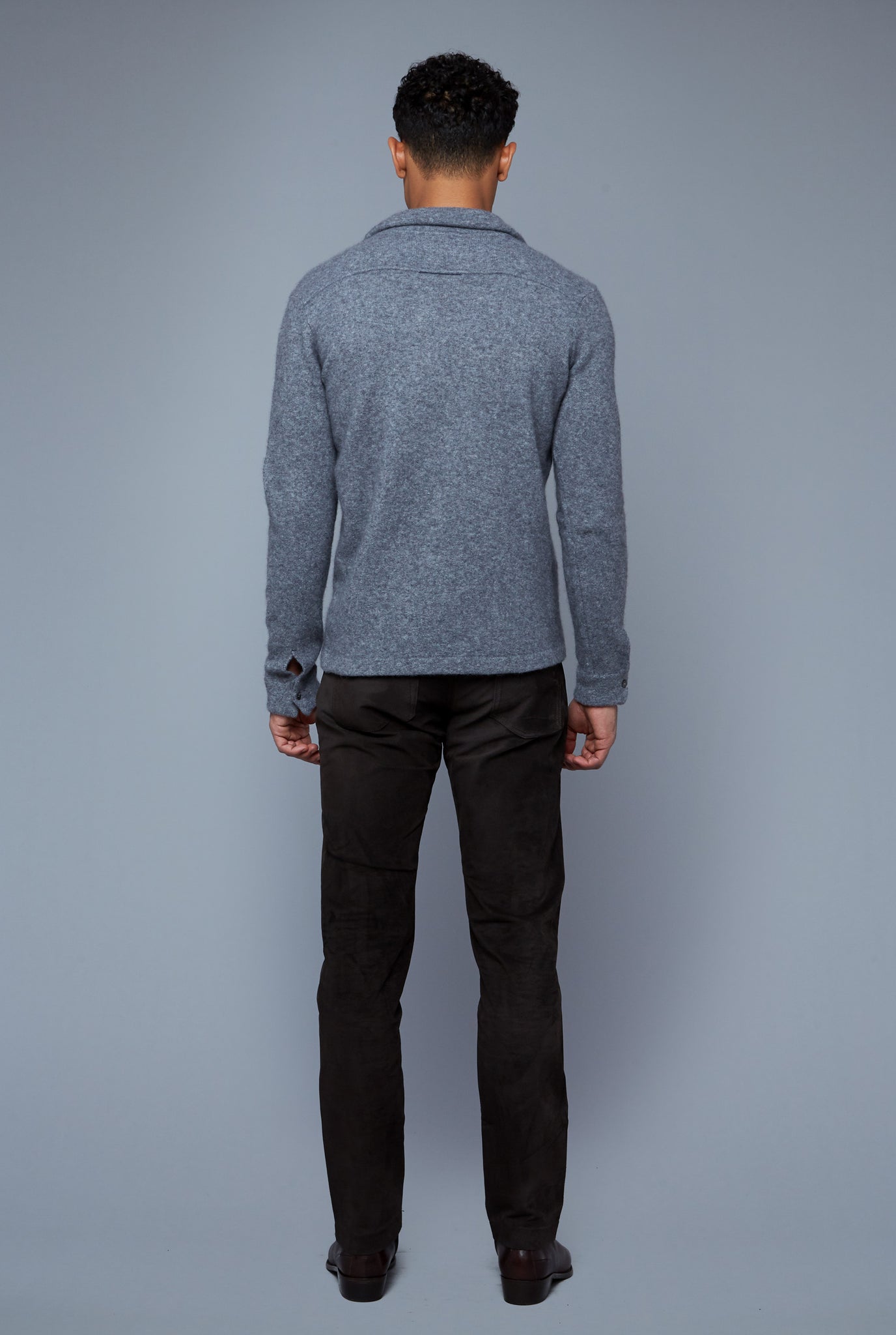 Back View: Model Tre Boutilier wearing Cashmere Boucle Sweater