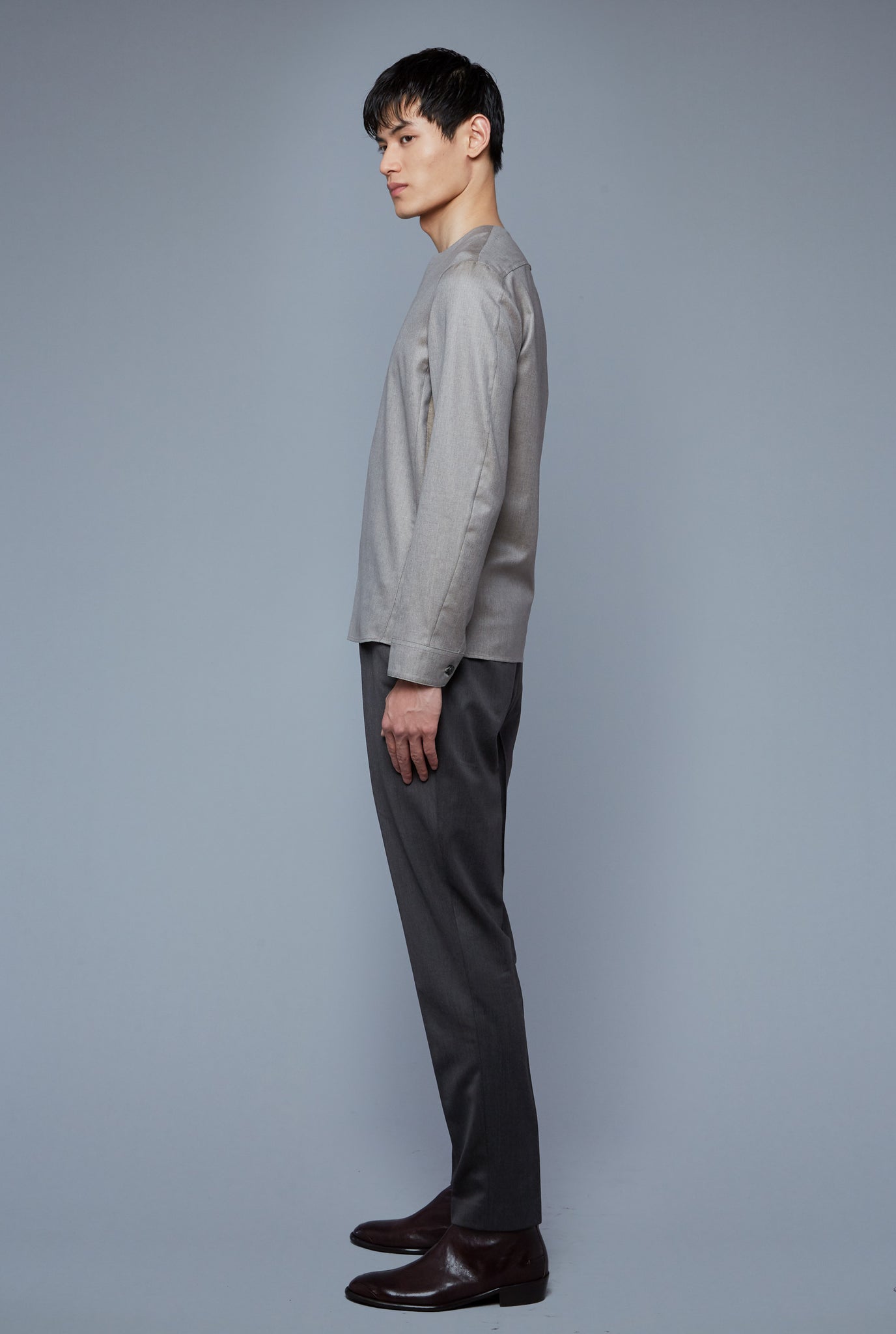 Side View: Model Qiang Li wearing Woven Henley