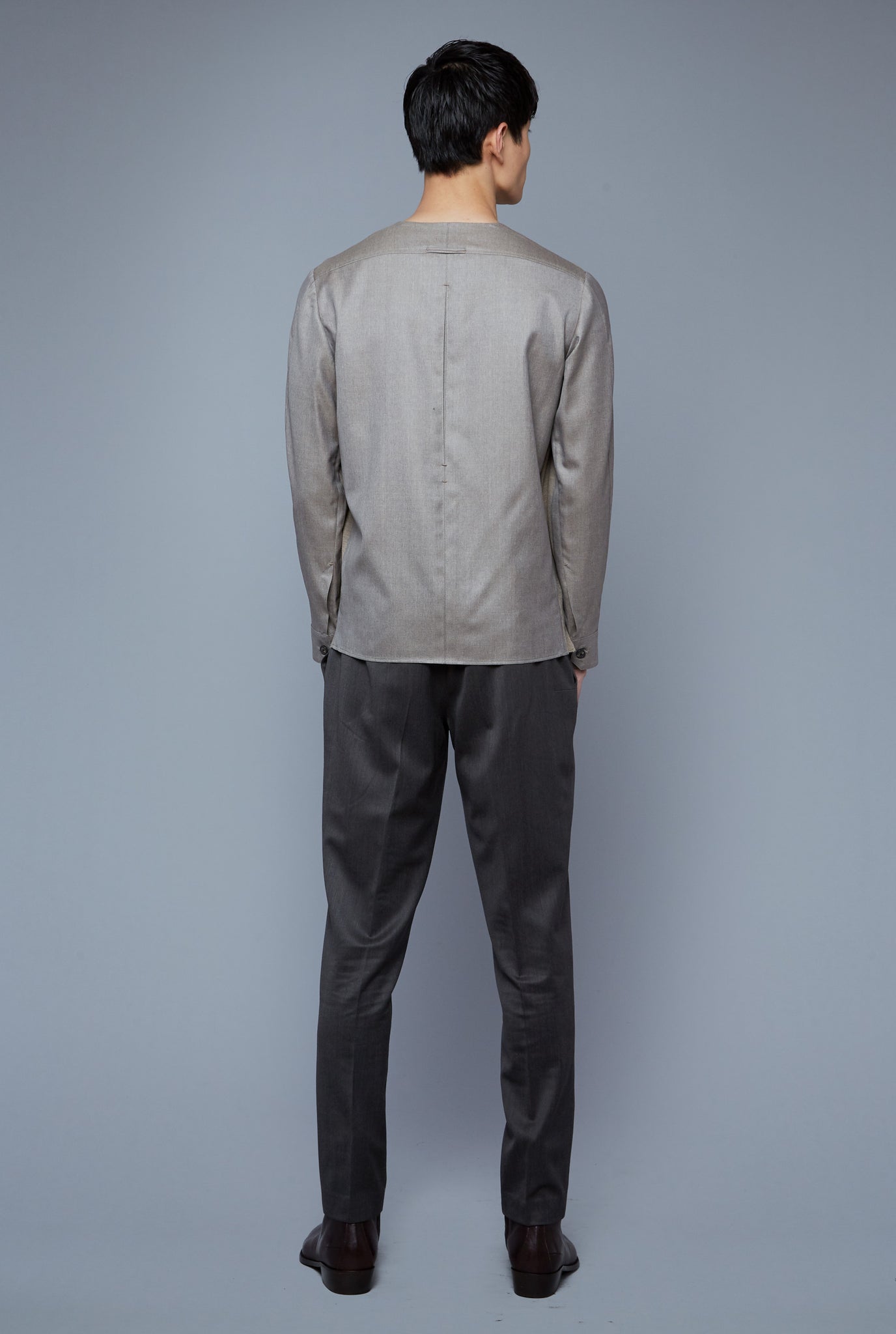 Back View: Model Qiang Li wearing Woven Henley