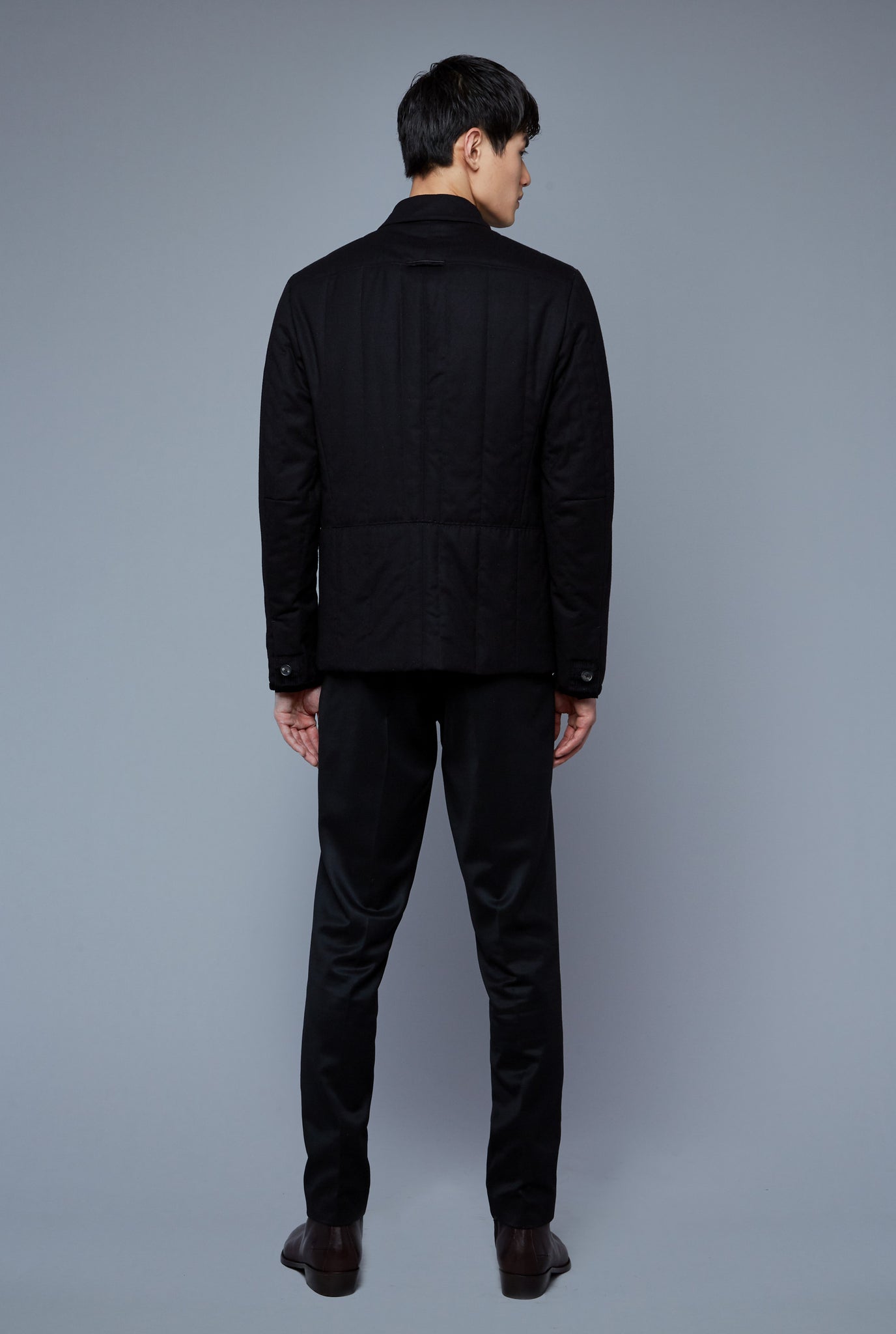 Back View: Model Qiang Li wearing Down Téchin Jacket