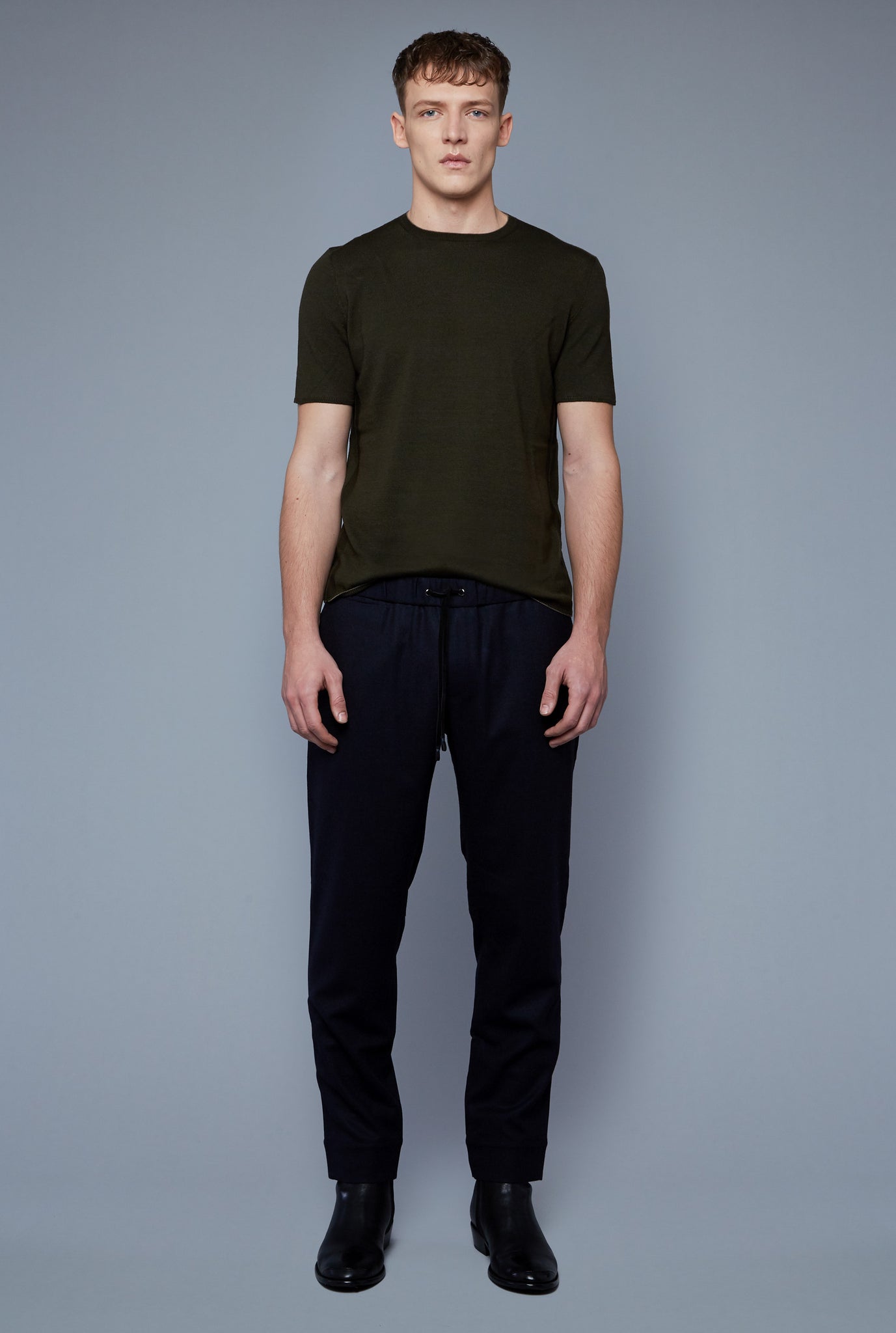 Front View: Model Milos Drago wearing Short Sleeve Sweater Tee