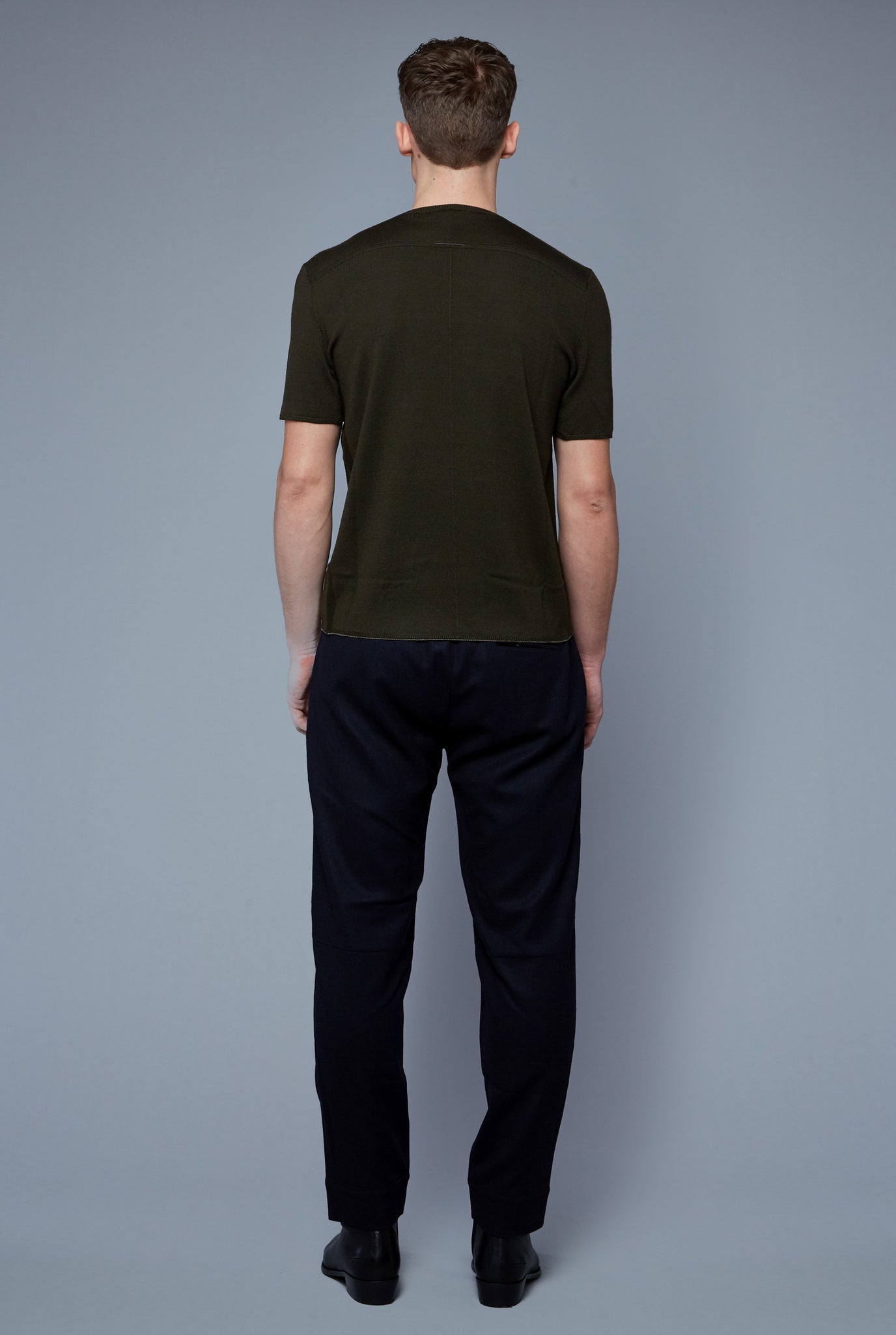 Back View: Model Milos Drago wearing Short Sleeve Sweater Tee