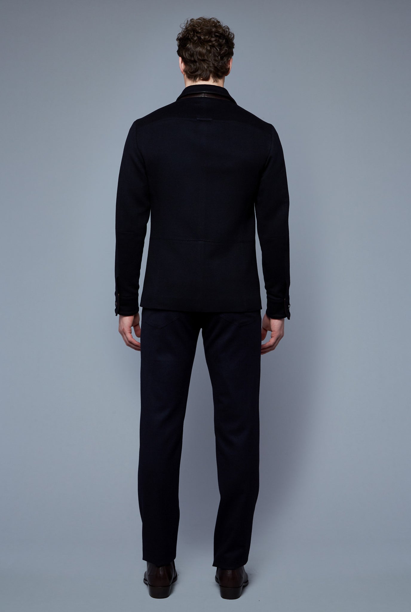 Back View: Model Hans Weiner wearing Téchin Jacket