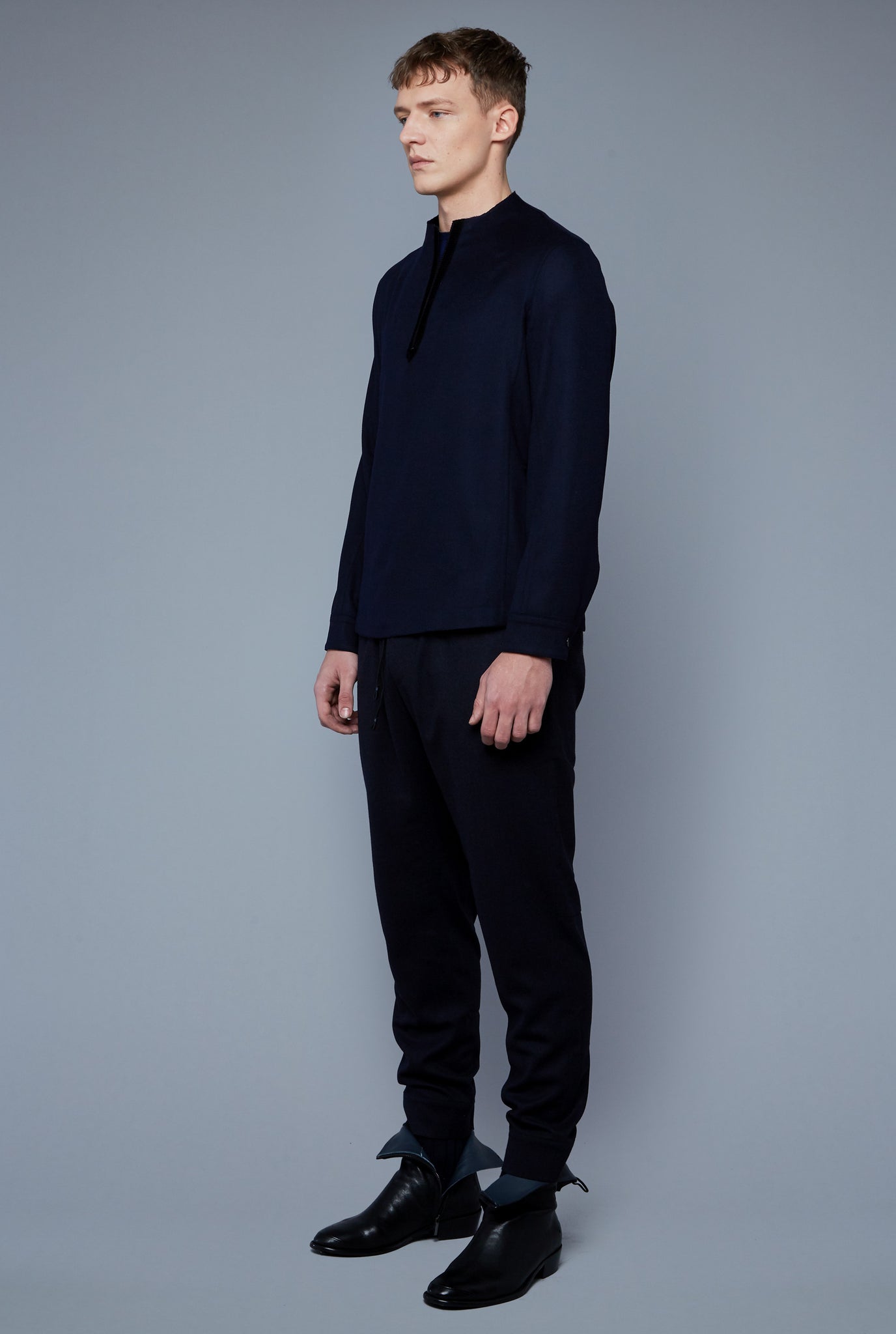 Three Quarter View: Model Milos Drago wearing Royal Shirt