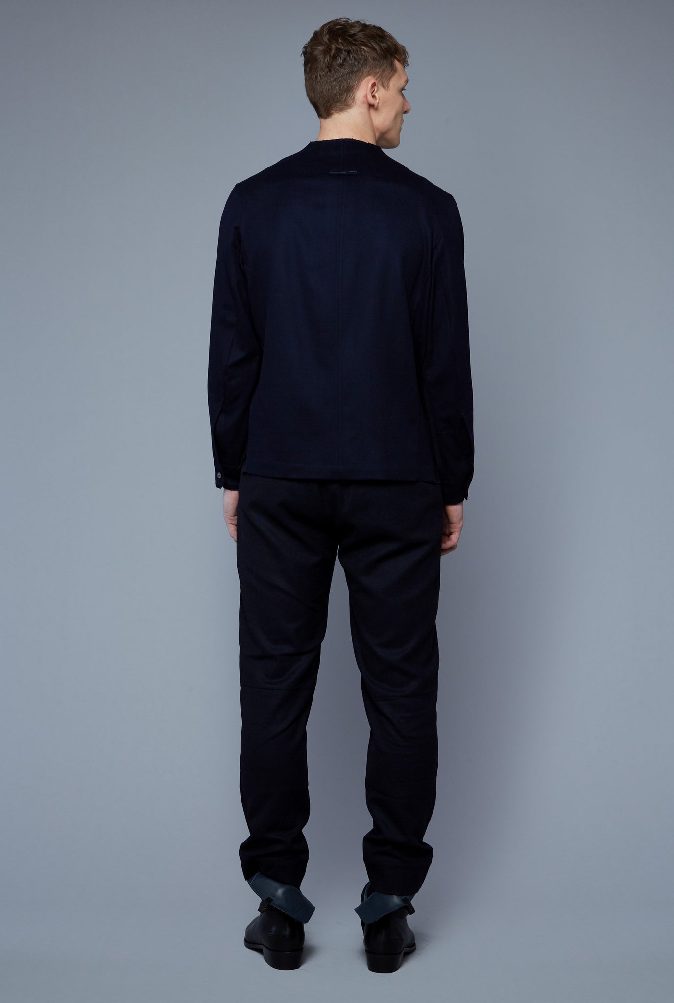 Back View: Model Milos Drago wearing Royal Shirt
