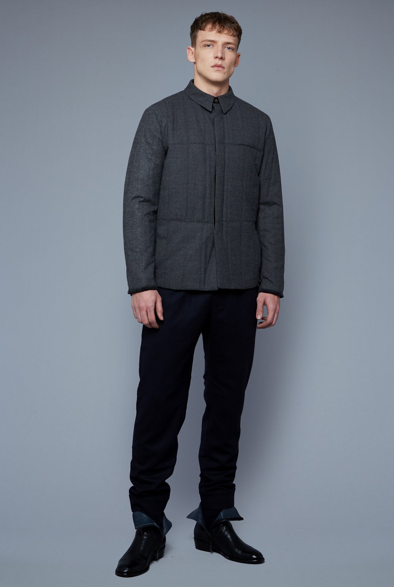 Front View: Model Milos Drago Wearing Down Téchin Jacket