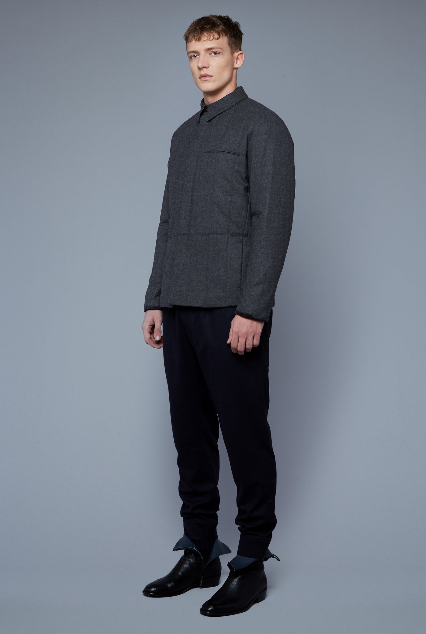 Three Quarter View: Model Milos Drago Wearing Down Téchin Jacket