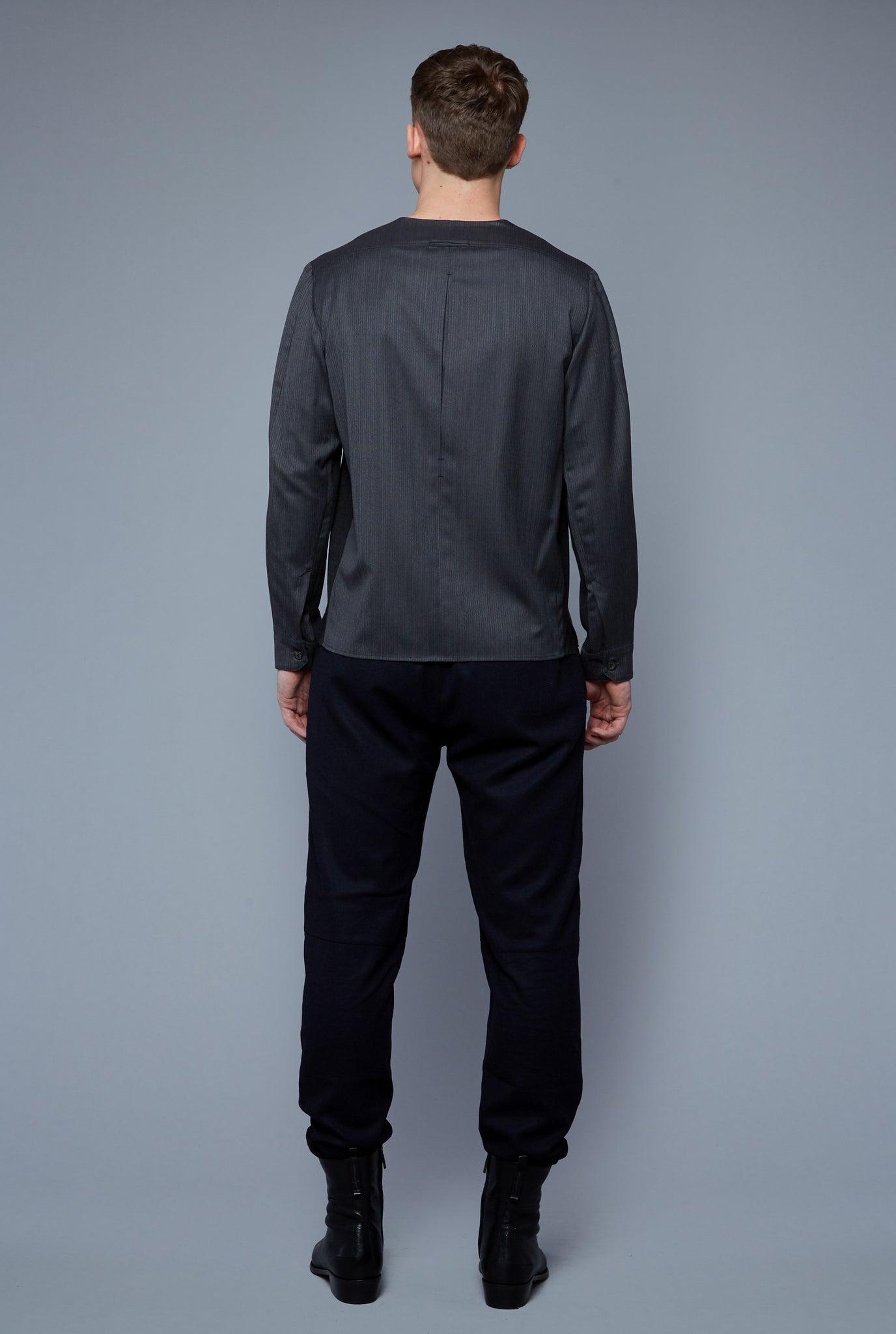 Back View: Model Milos Drago wearing Woven Henley