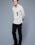 Three Quarter View: Model Hans Weiner wearing Linen Greenwhich Shirt