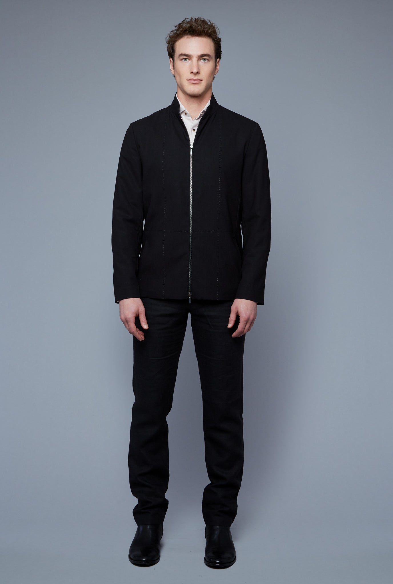 Front View: Model Hans Weiner wearing Seasonless Bomber