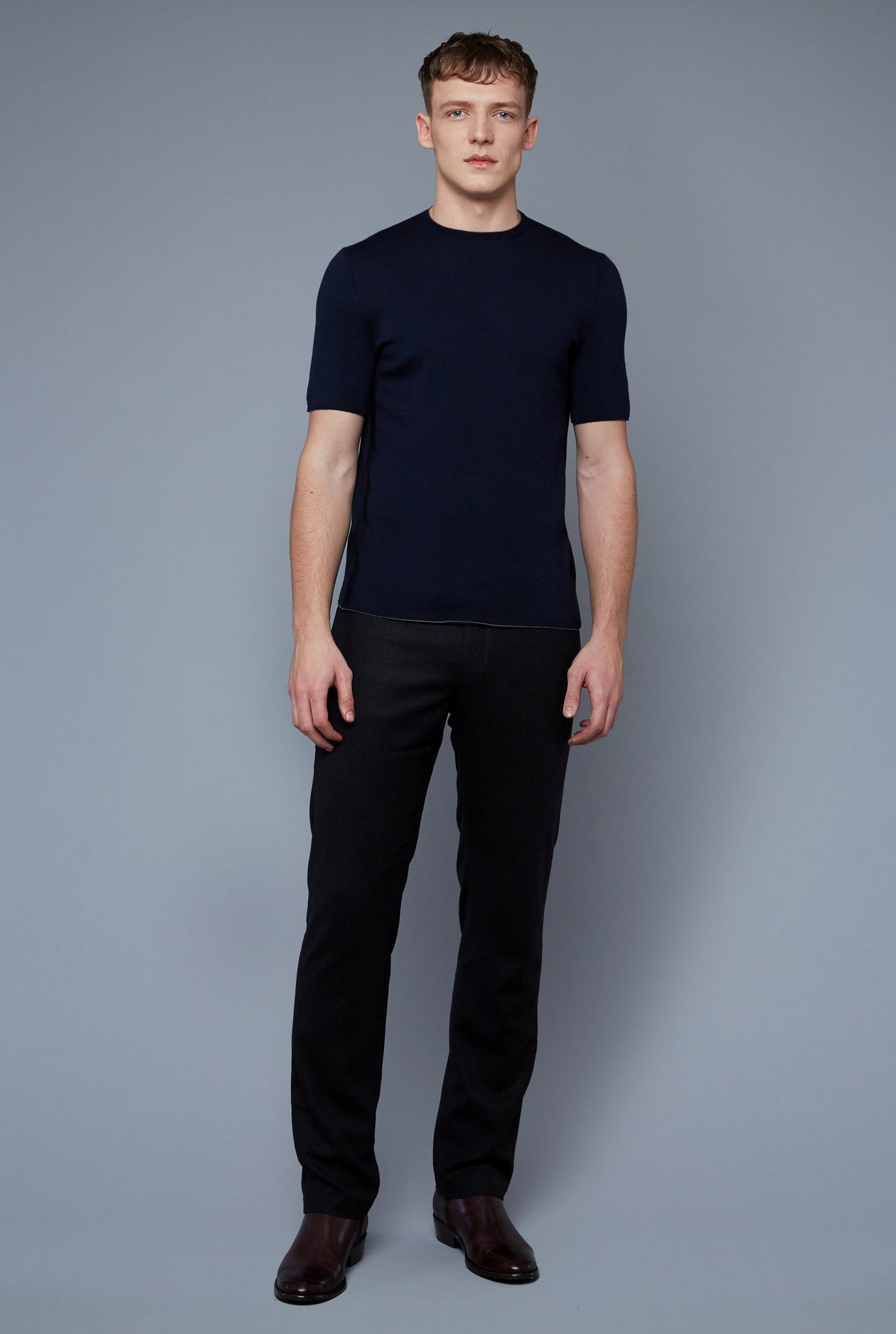 Front View: Model Milos Drago wearing Short Sleeve Sweater Tee