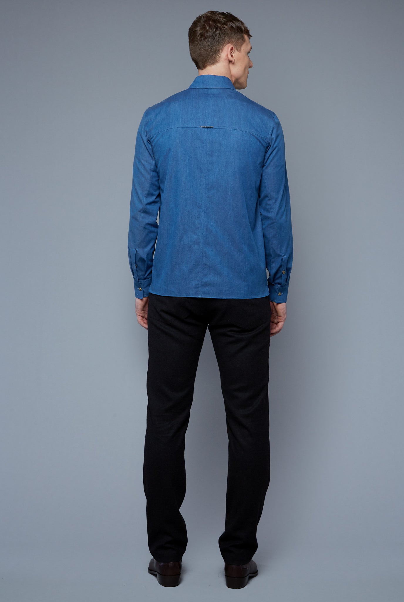 Back View: Model Milos Drago wearing Kojima Denim Shirt
