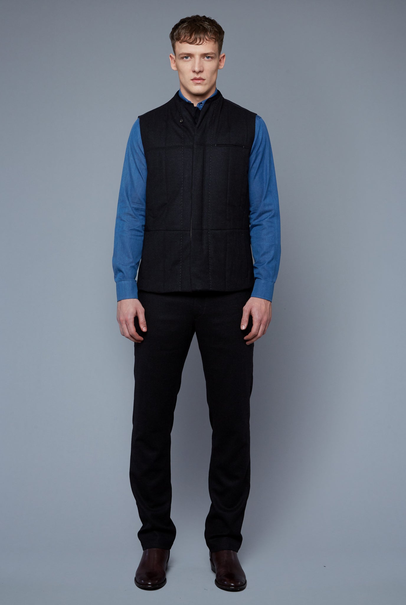 Front View: Model Milos Drago wearing Down Vest