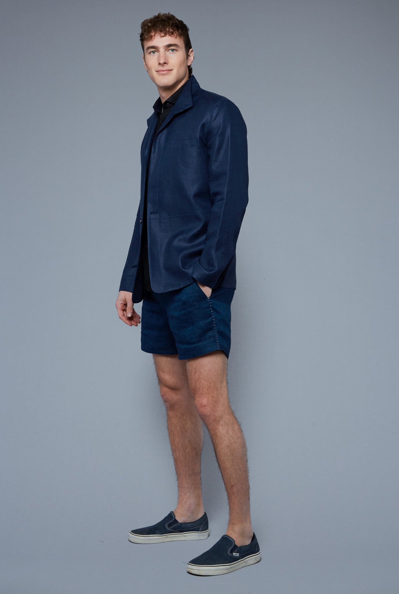 Three Quarter View: Model Hans Weiner wearing Architect's Jacket