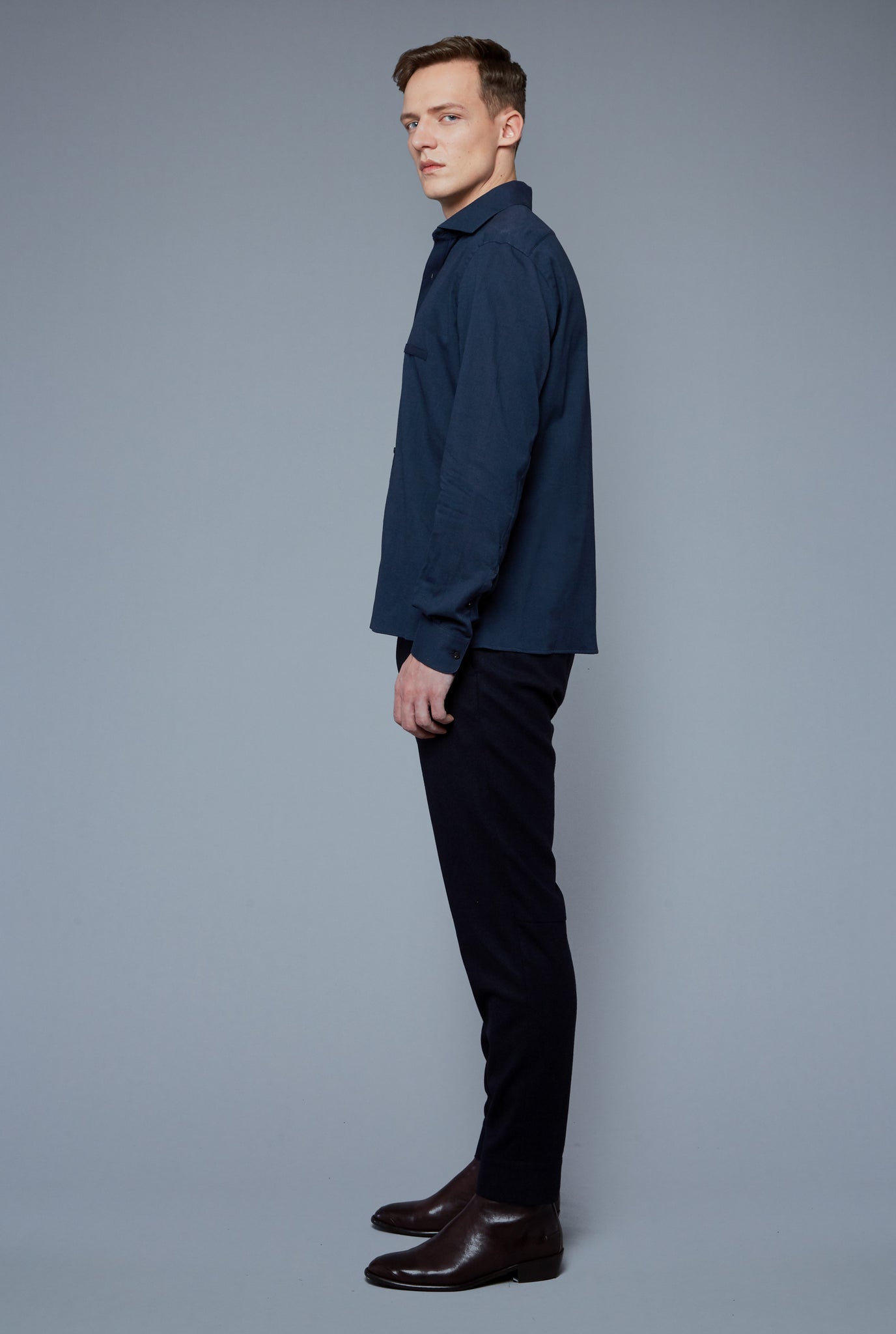 Side View: Model Milos Drago wearing Flannel Greenwich Shirt