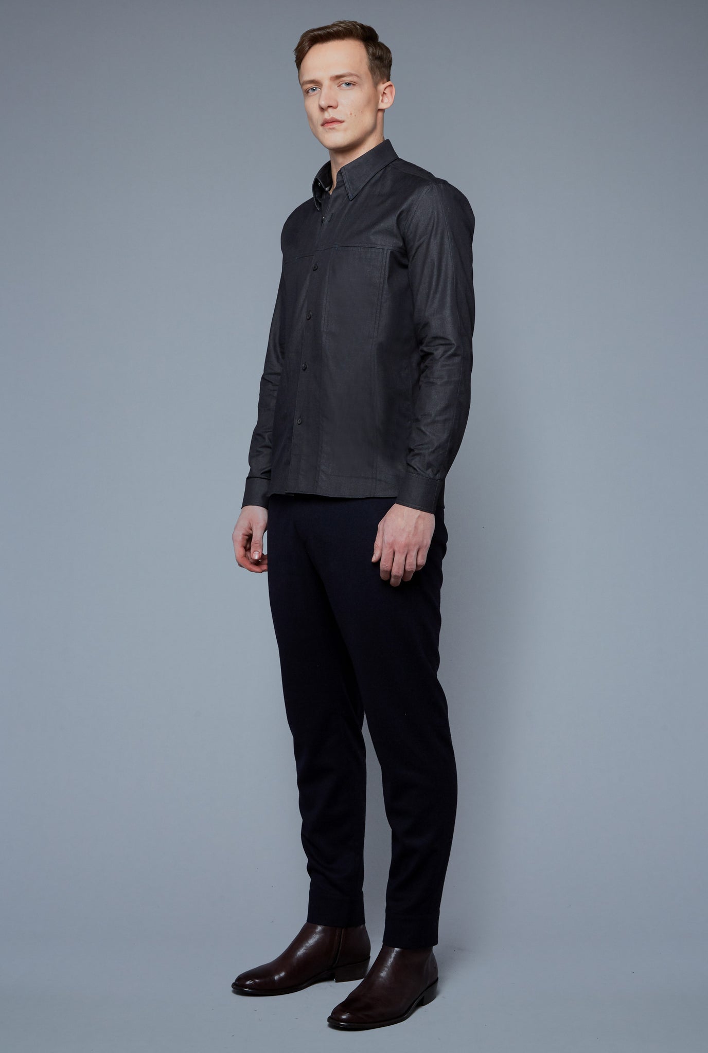 Three Quarter View: Model Milos Drago wearing Kojima Denim Shirt