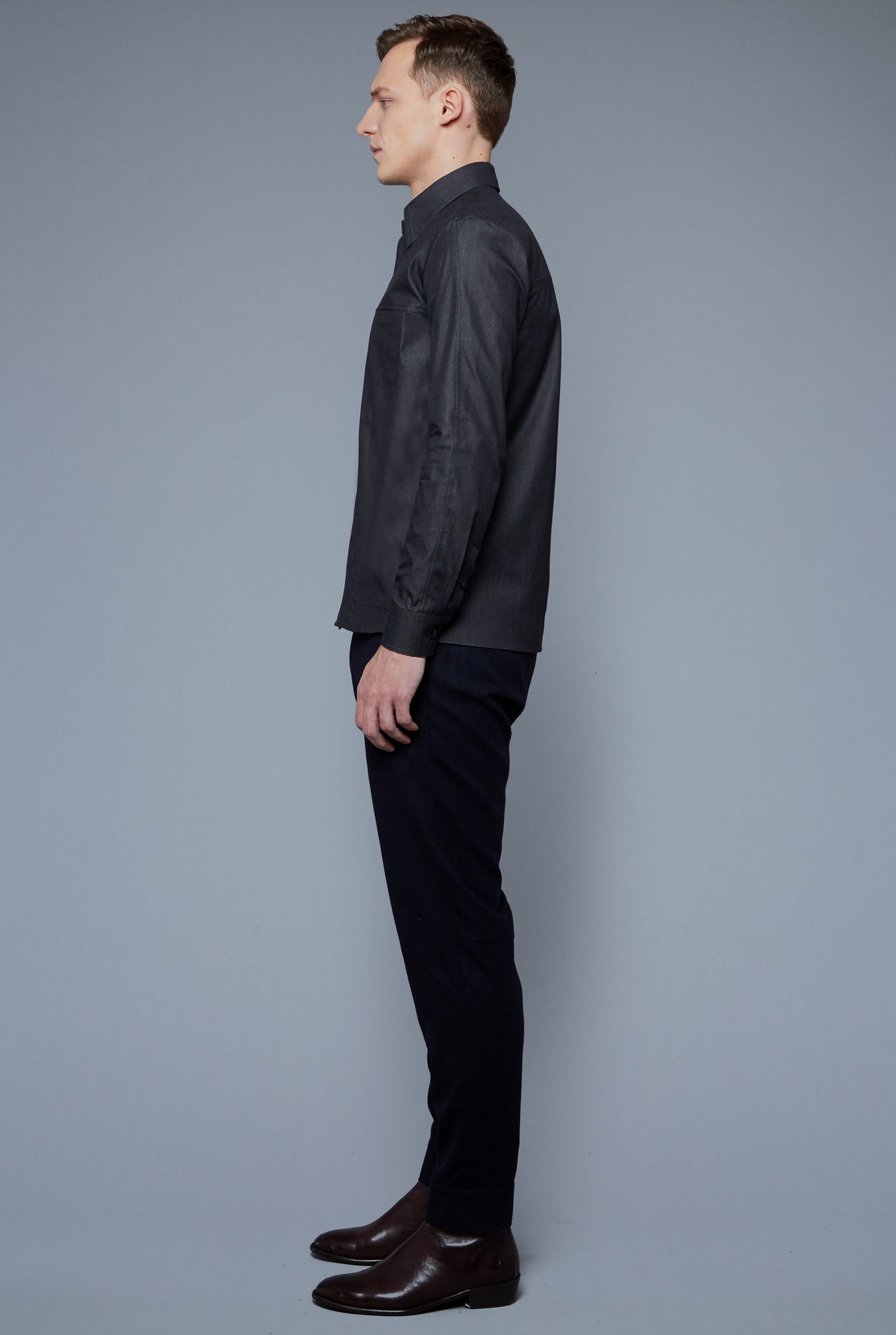 Side View: Model Milos Drago wearing Kojima Denim Shirt