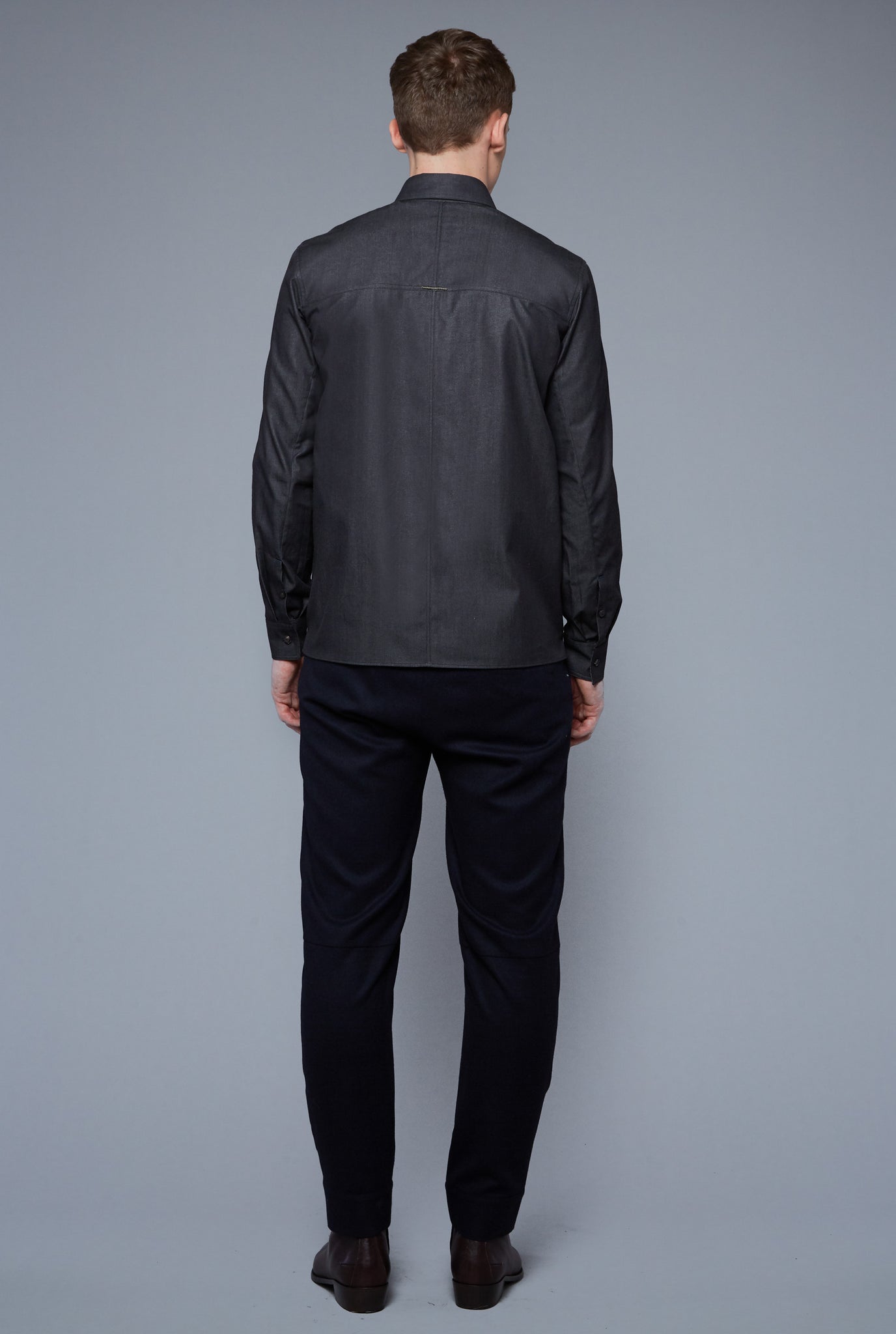 Back View: Model Milos Drago wearing Kojima Denim Shirt