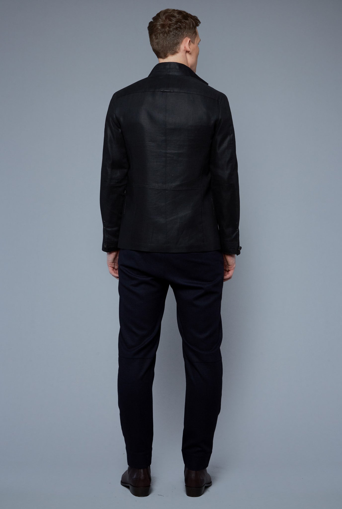 Back View: Model Milos Drago wearing Architect's Jacket