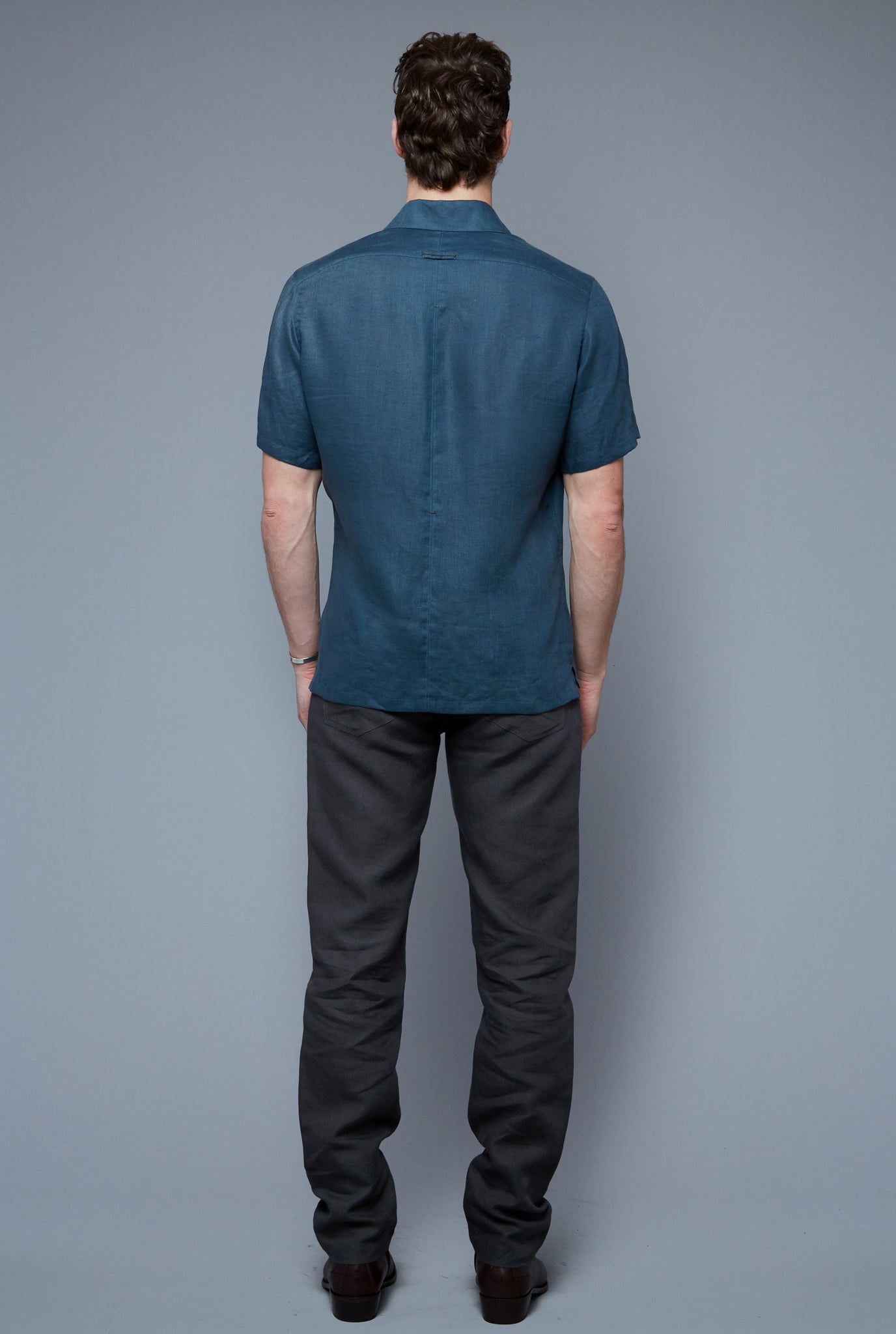 Back View: Model Hans Weiner wearing Aloe Linen Shirt
