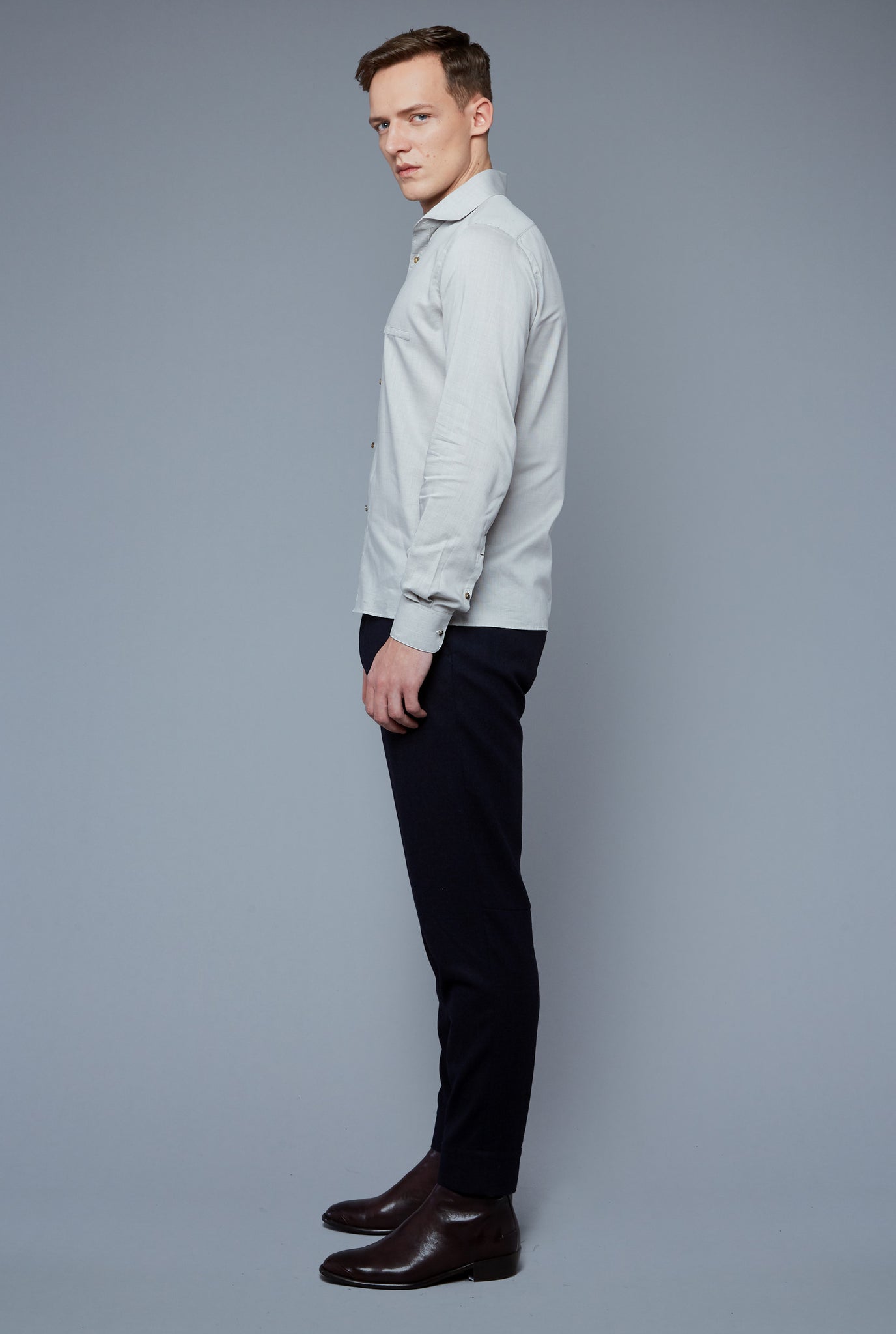 Side View: Model Milos Drago wearing Greenwich Shirt Microcheck