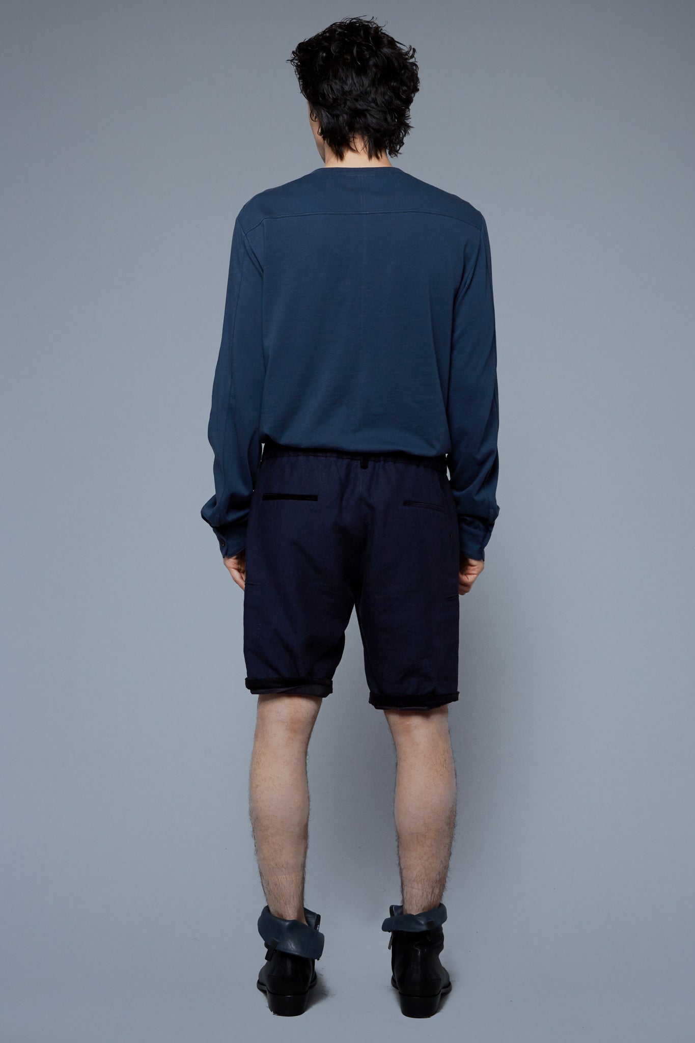 Back View: Model Asher wearing Lounge Shorts