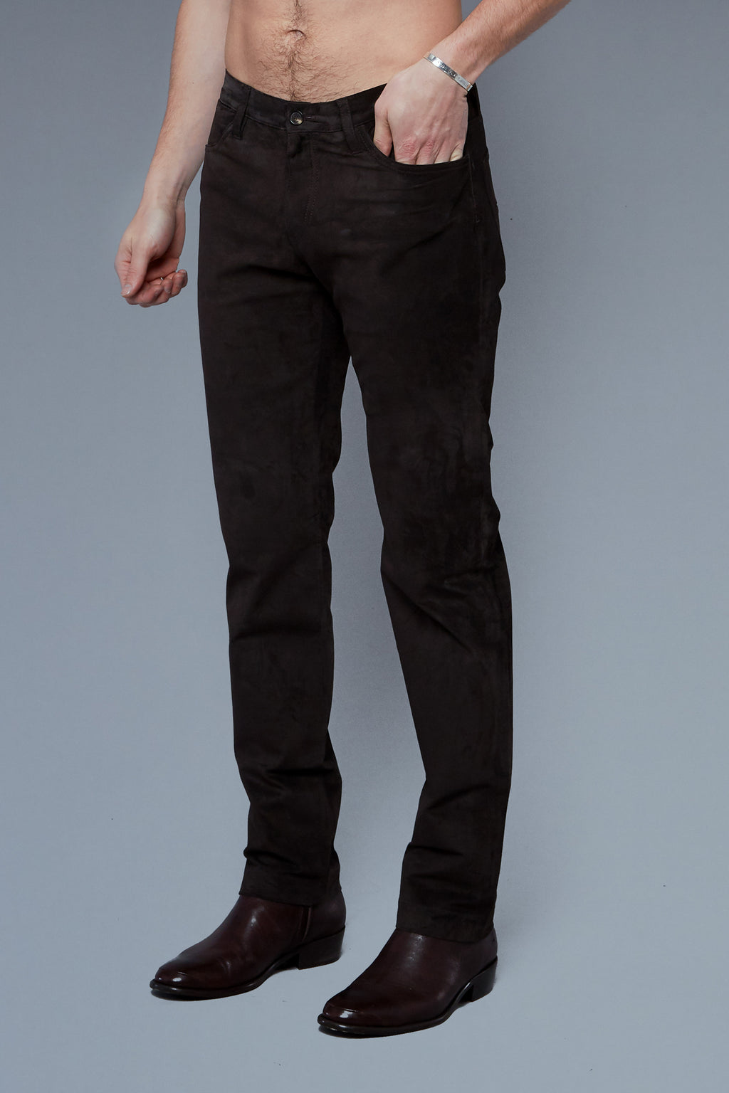 Three Quarter View: Model Hans Weiner wearing Suede 5 Pocket Pants