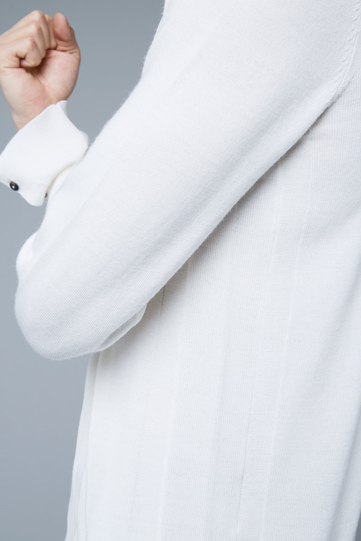 Detail View: Model Qiang Li wearing Long Sleeve Sweater Tee